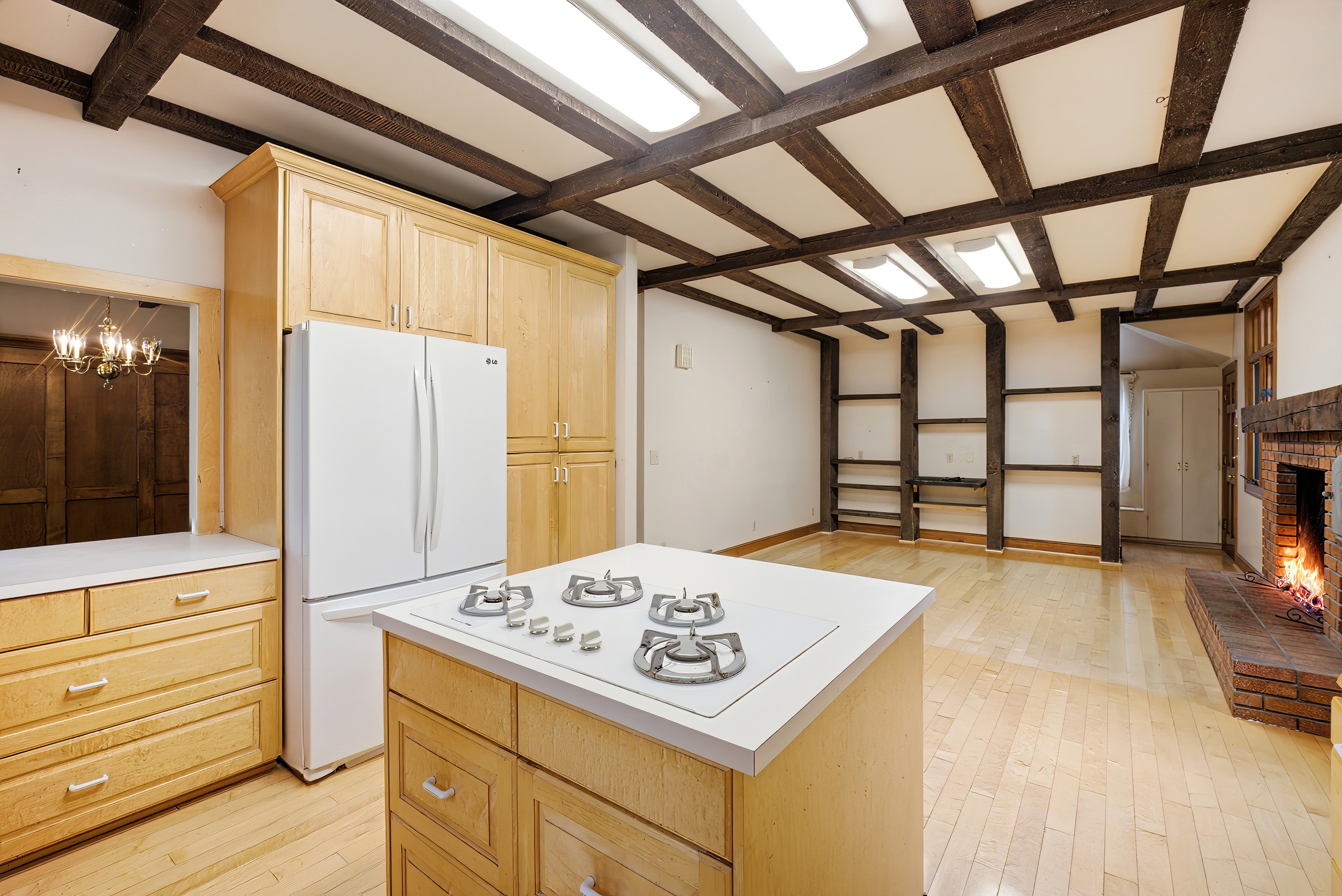 Exposed beam ceiling with recessed lighting