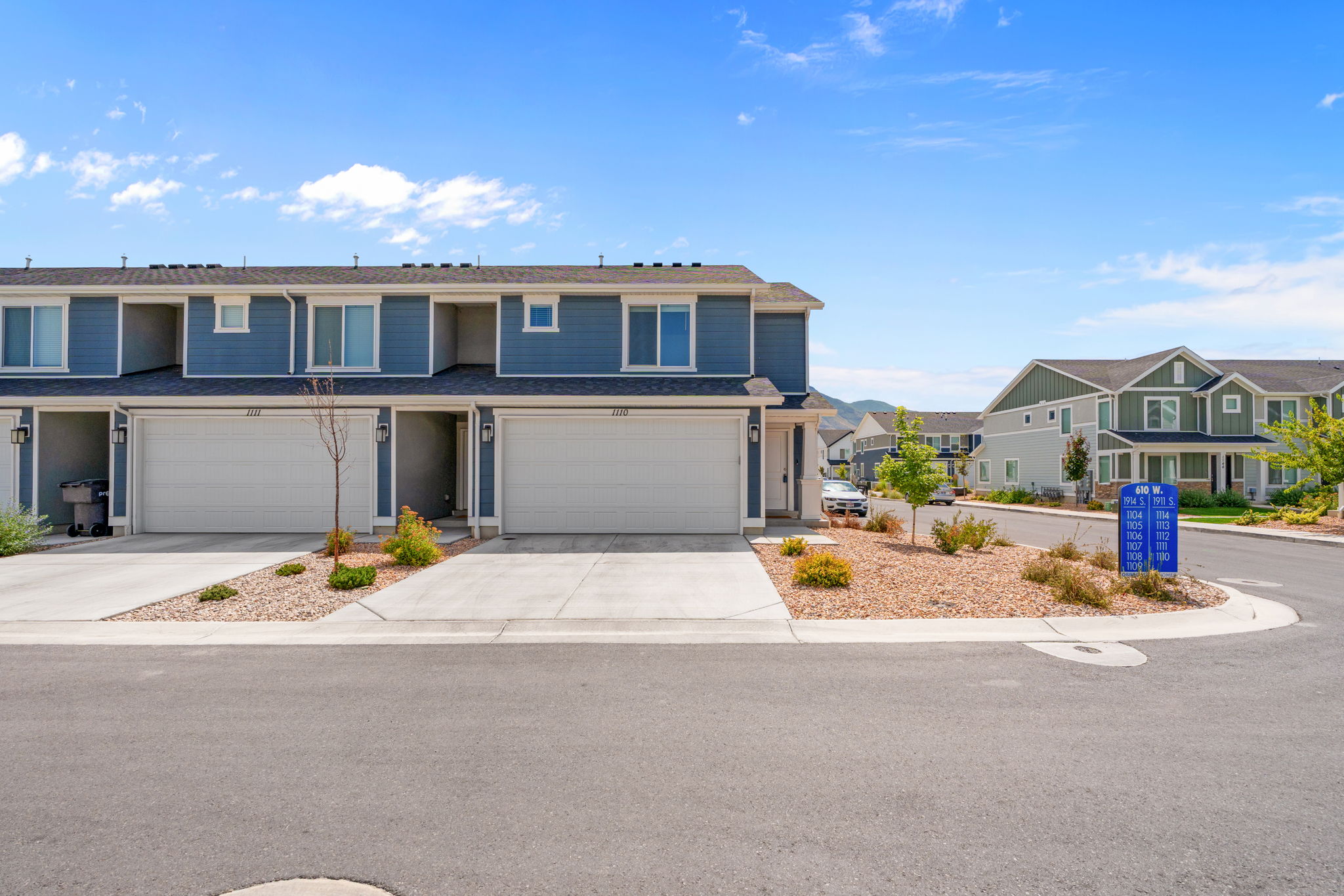 2 Story Townhome. End Unit. Lovely blue hardyboard siding. Porch. Front door and back entrnaces! Lots of parking, including in the driveway. 2 car garage.
