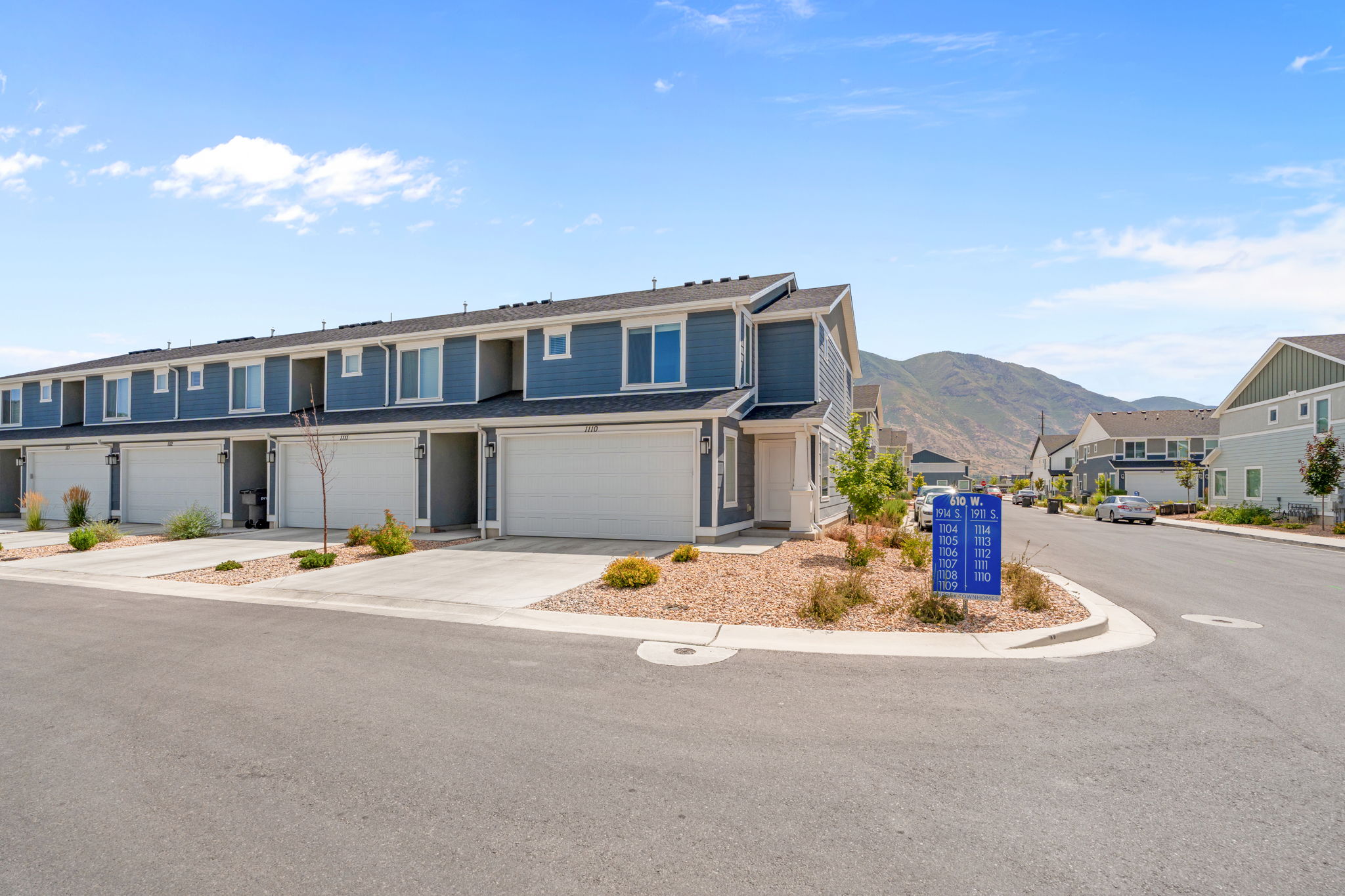2 Story Townhome. End Unit. Lovely blue hardyboard siding. Porch. Front door and back entrnaces! Lots of parking, including in the driveway. 2 car garage.