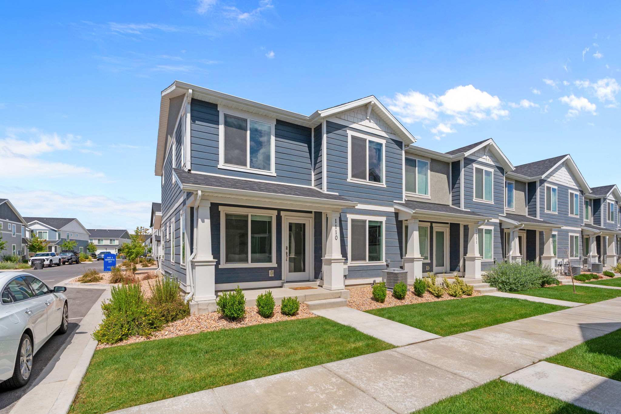 2 Story Townhome. End Unit. Lovely blue hardyboard siding. Porch. Front door and back entrnaces! Lots of parking, including in the driveway. 2 car garage.