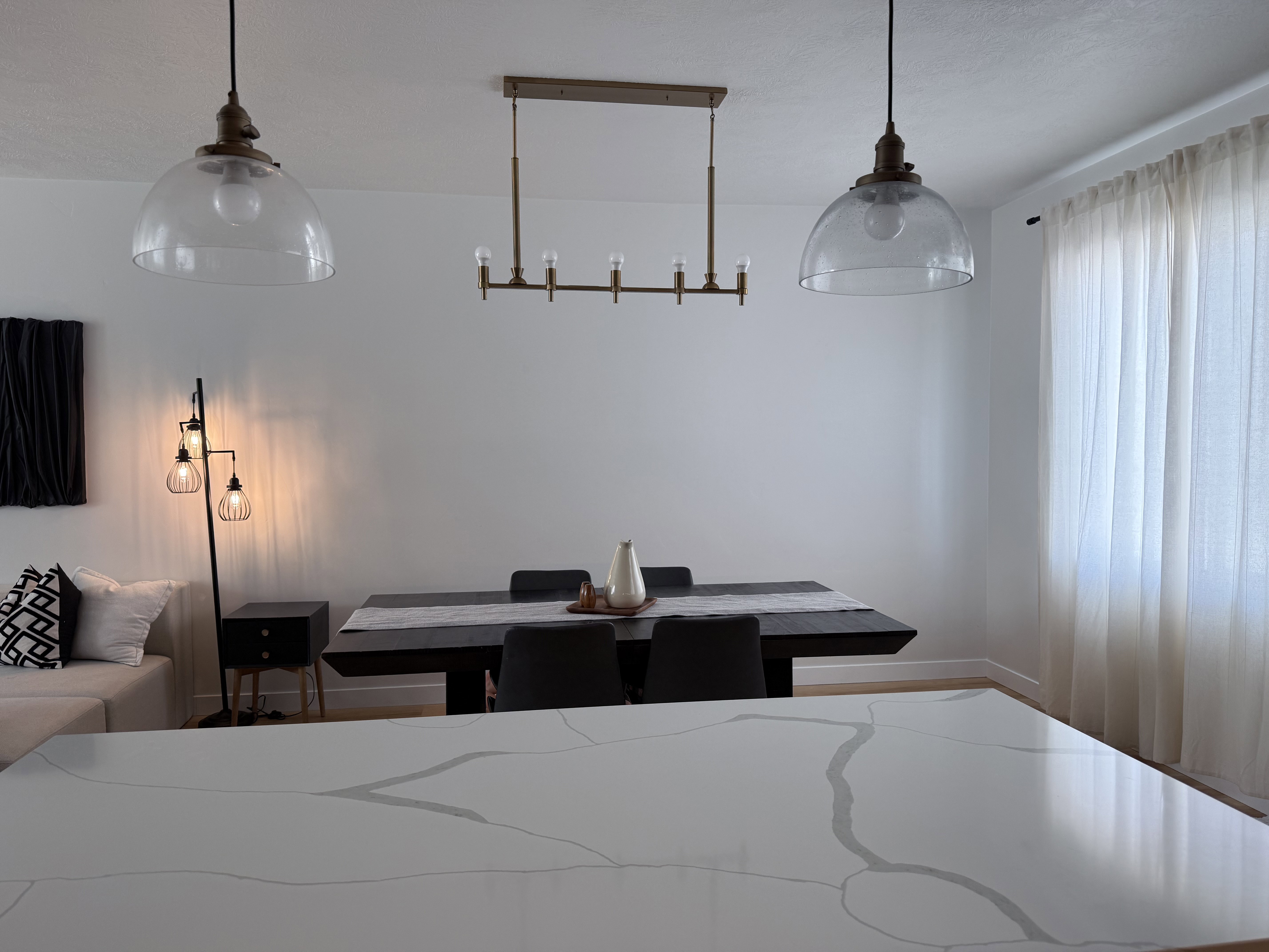 White quartz countertop featuring prominent gray veining