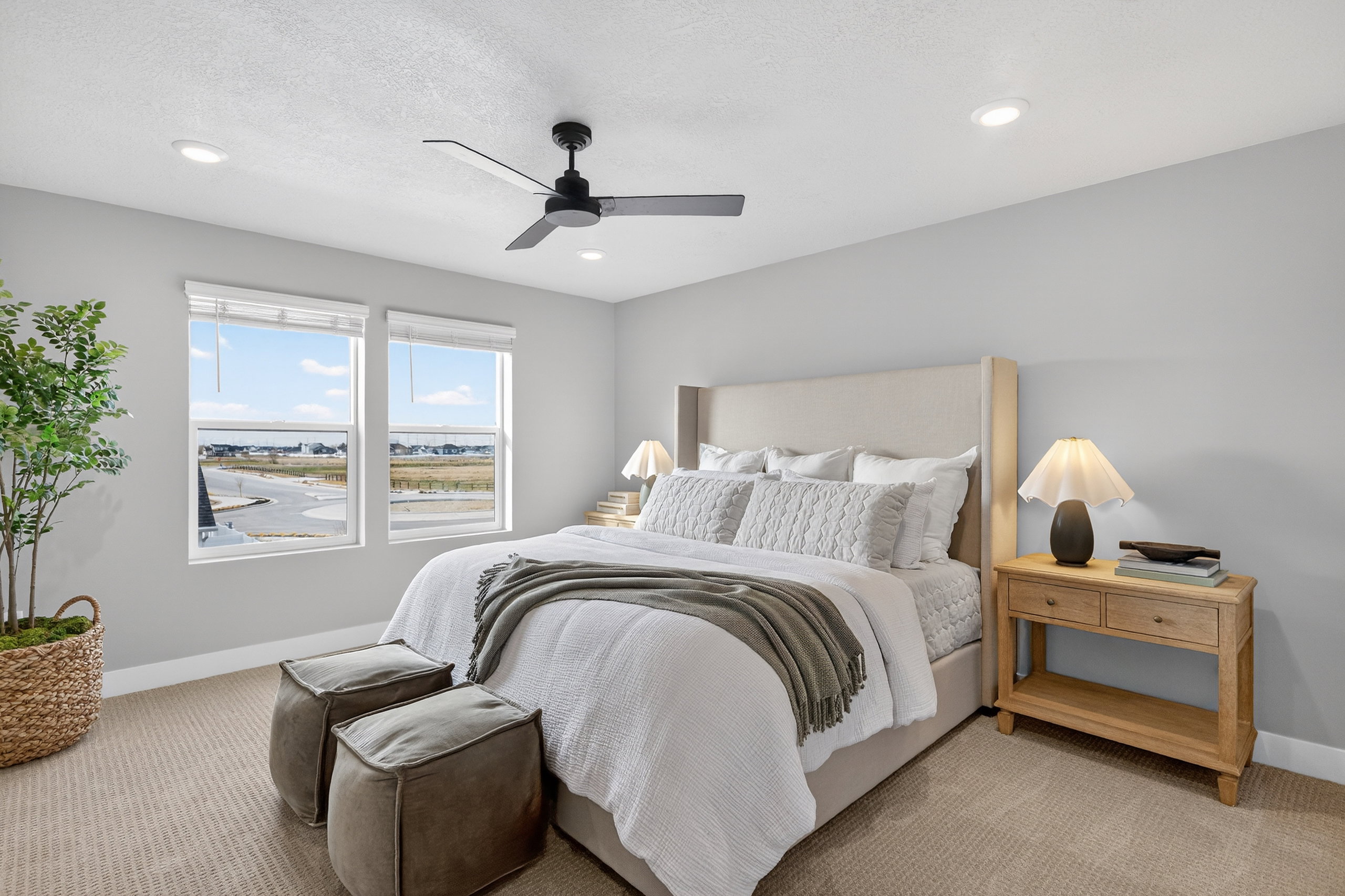 Light gray walls complement the neutral carpeted flooring