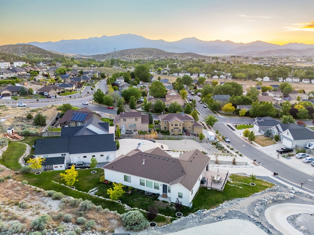 Residential neighborhood featuring varied architectural styles and mature trees