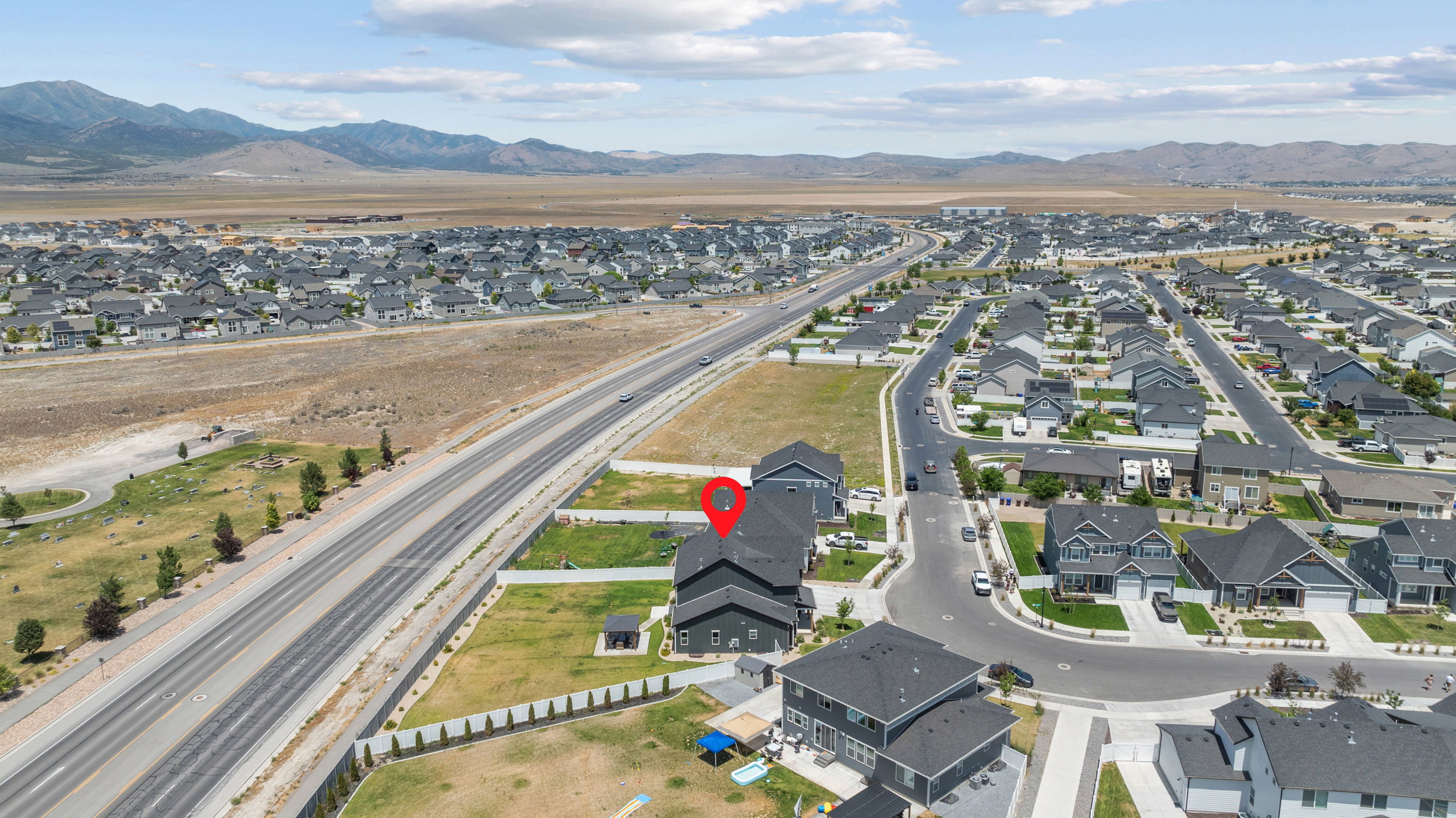 Aerial overview of a residential neighborhood with new construction homes