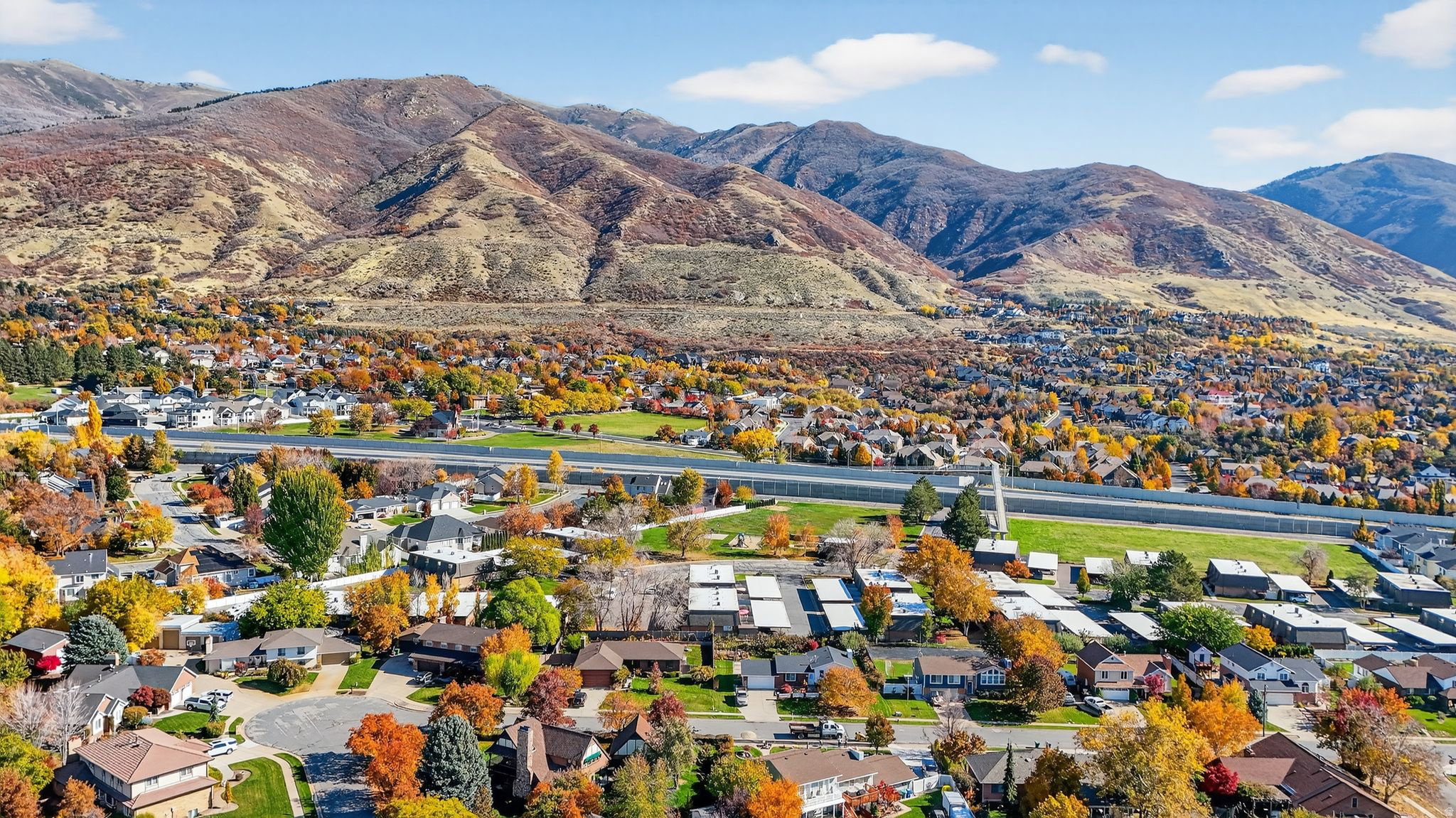Residential community set against a backdrop of mountains