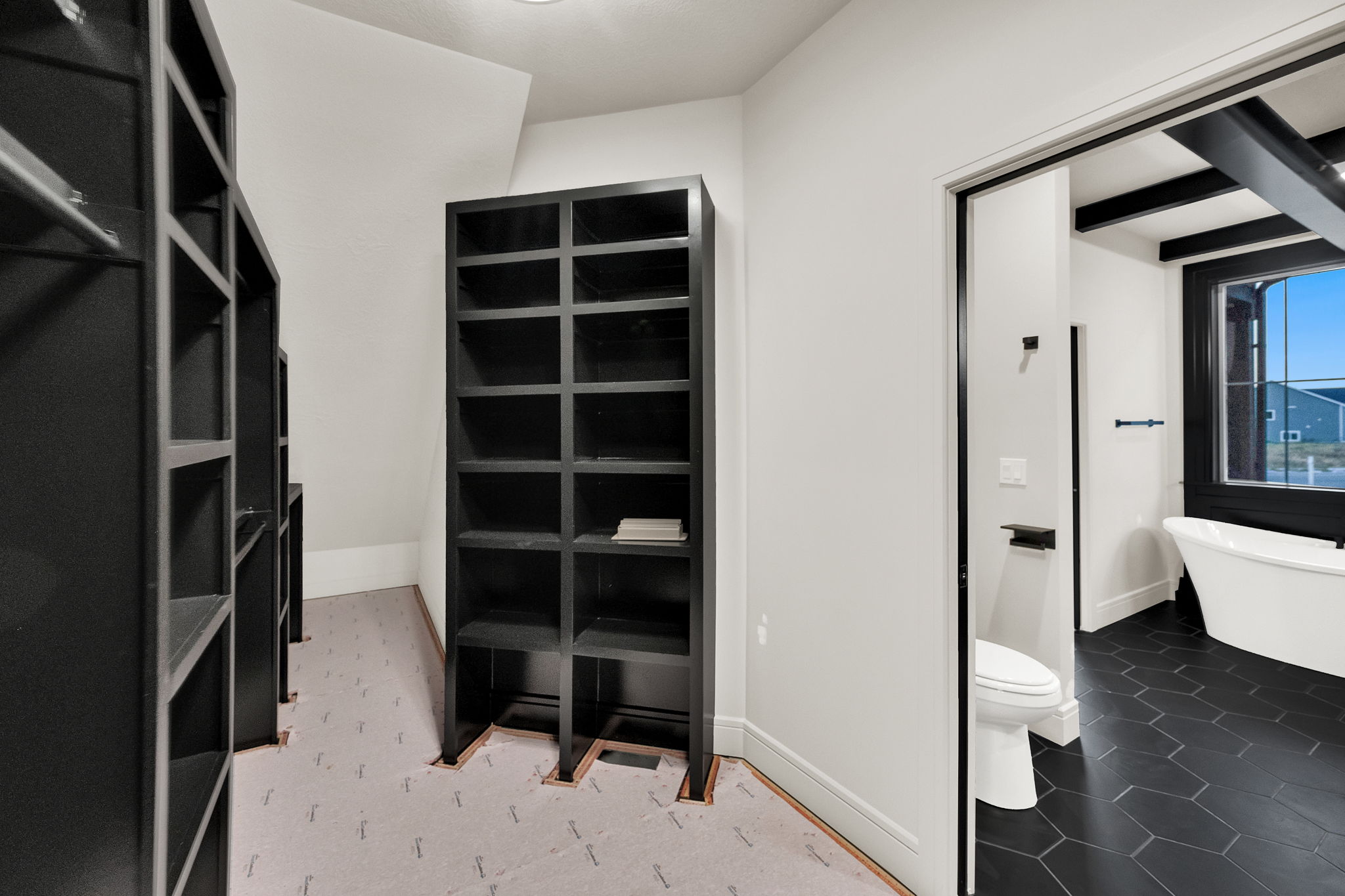 Walk-in closet with built-in shelving units