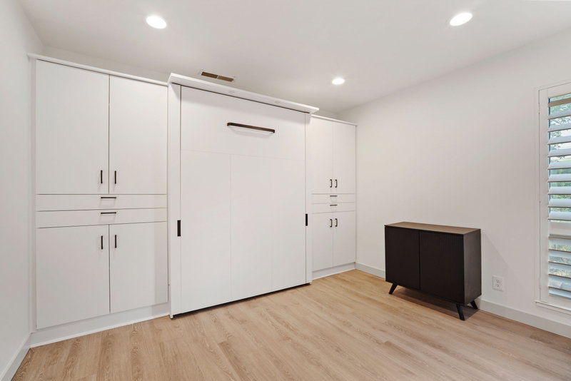 Murphy Bed allows for 2nd bedroom to be used as an office or flex space