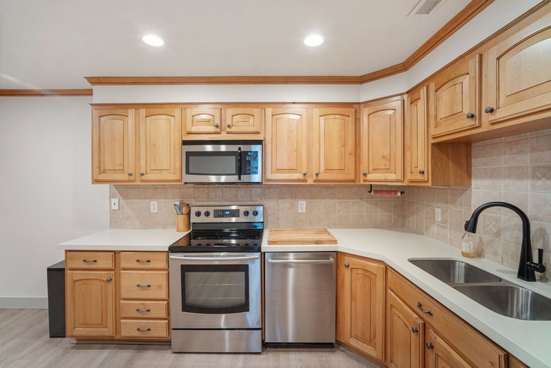 Spacious kitchen with stainless steel appliances