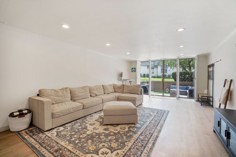Living room walk out to private patio