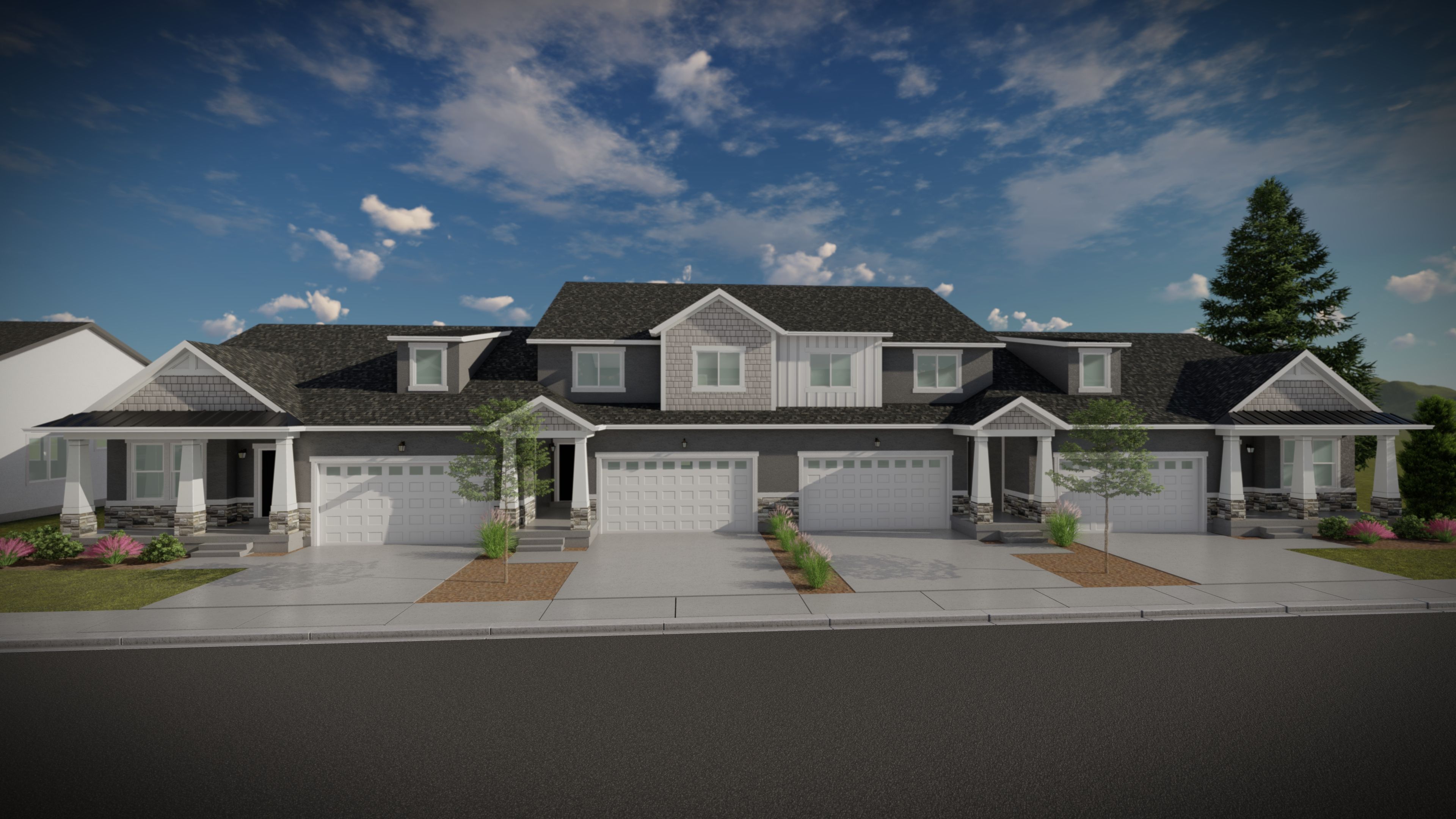 Modern townhome exteriors featuring dormer windows, stone veneer accents, and covered entryways