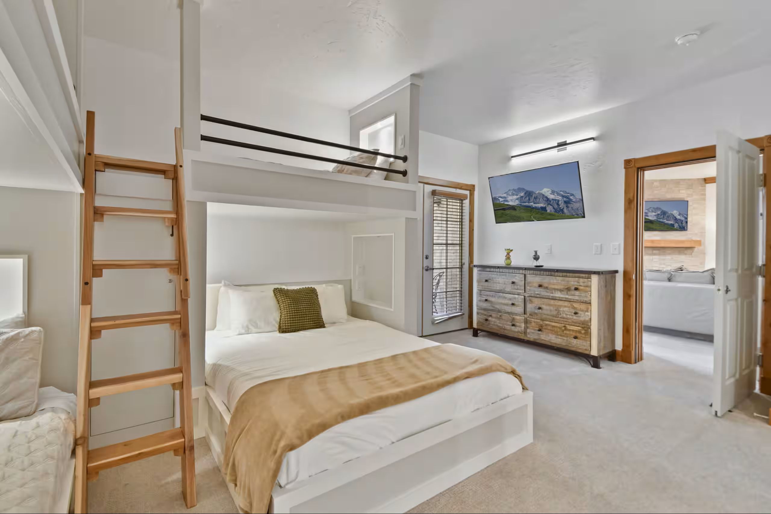 Built-in bunk beds with integrated ladder and safety rail