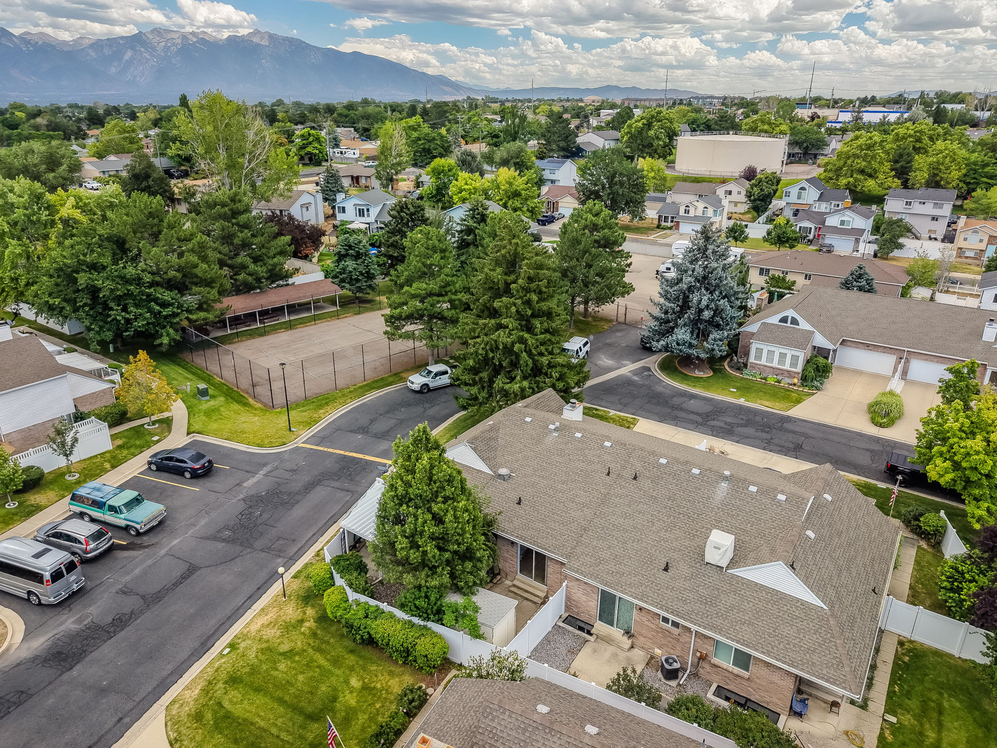 Aerial perspective showcasing a residential community with mountain scenery