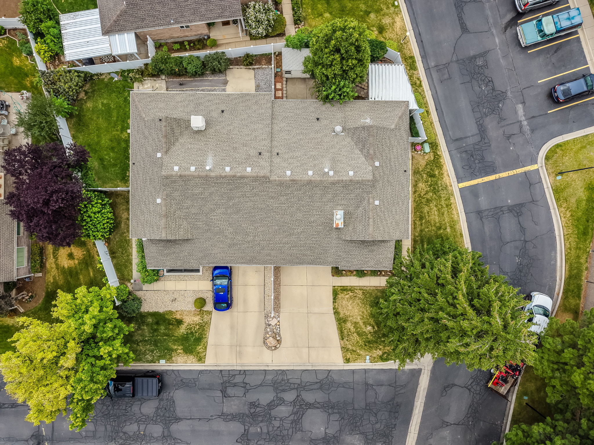 Pitched roofline with asphalt shingles