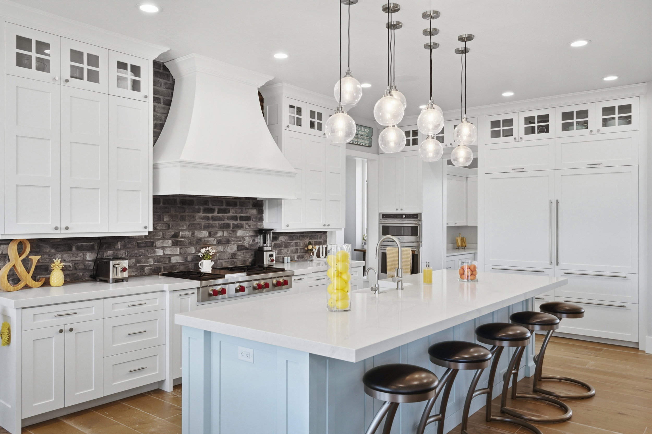 Gourmet kitchen featuring a large island with seating, a professional-grade range with a custom hood, integrated paneled appliances, a dark brick backsplash, and wood-finish flooring