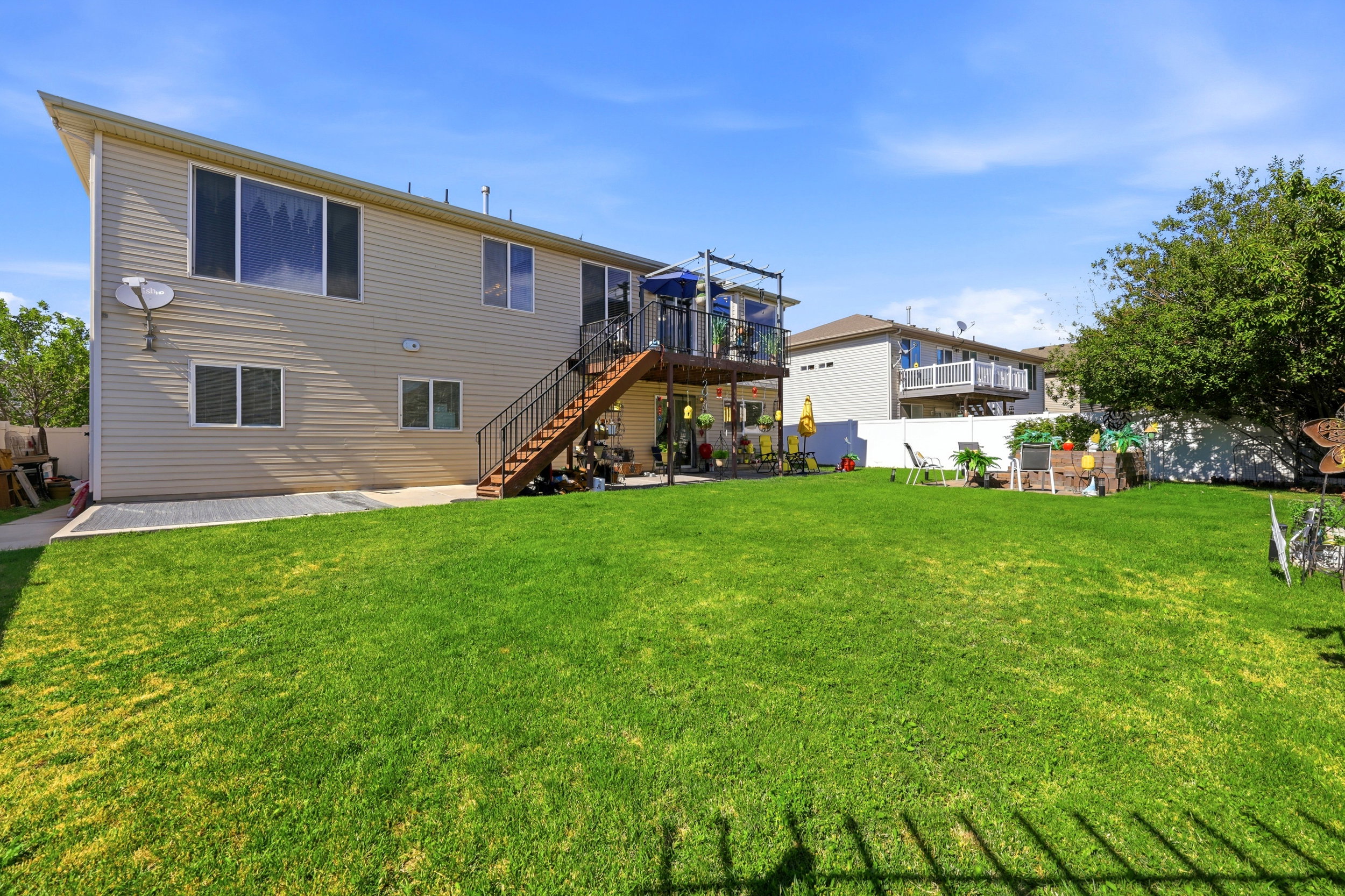 Expansive green lawn providing abundant outdoor space