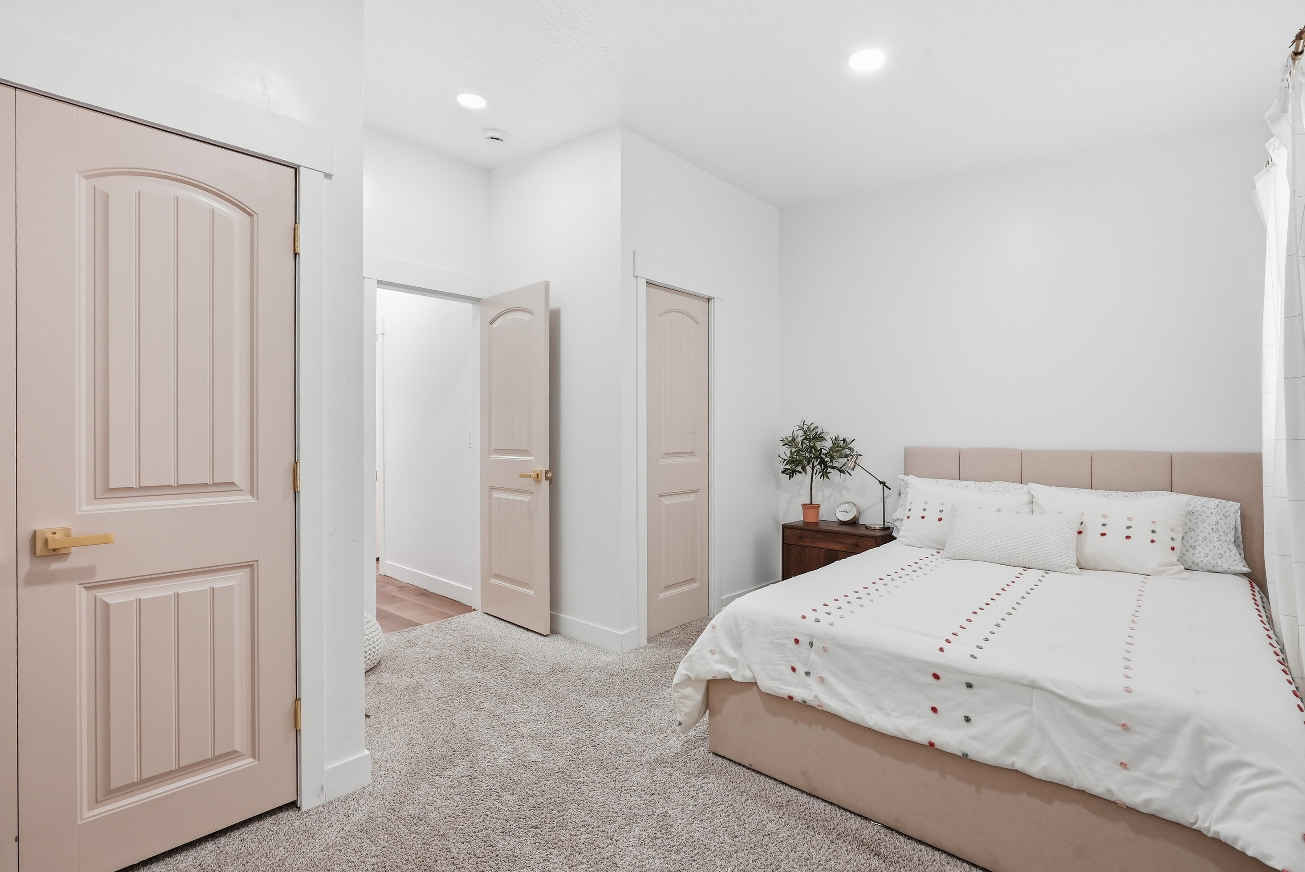 Primary Bedroom features a half bathroom.