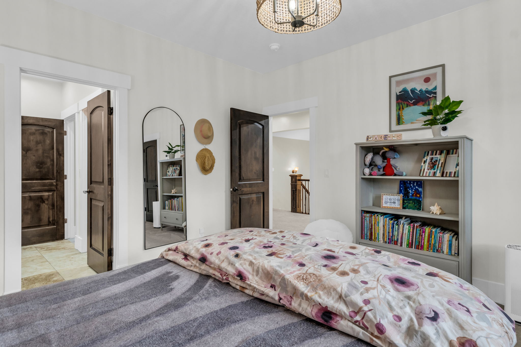 White walls complemented by dark wood doors and trim