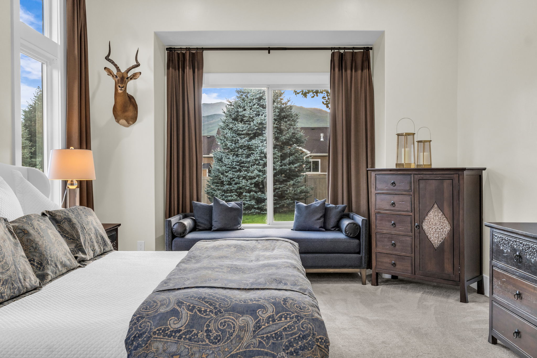 Plush carpeting throughout with a window seat