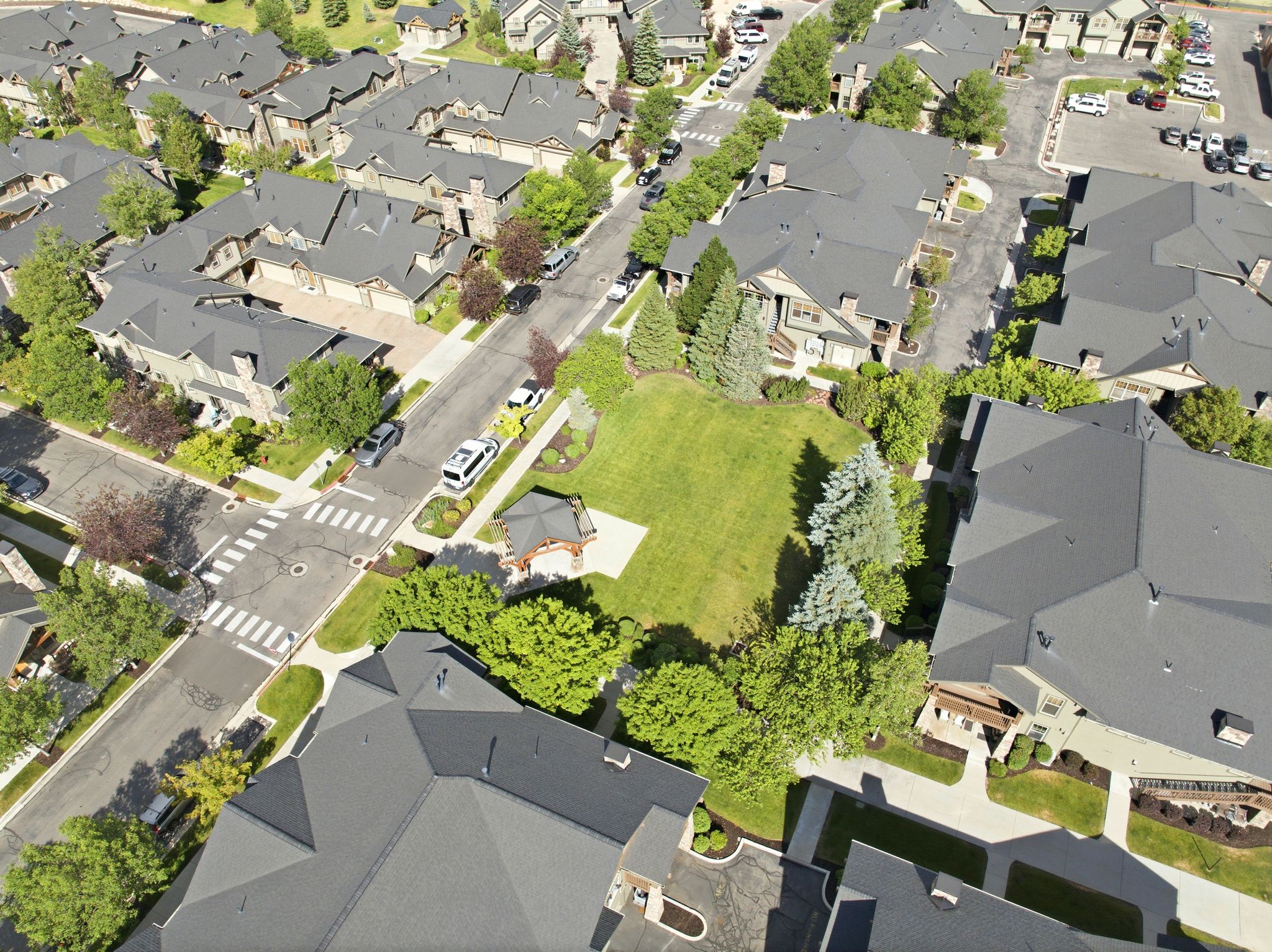 Aerial view showcasing a residential community with abundant green spaces