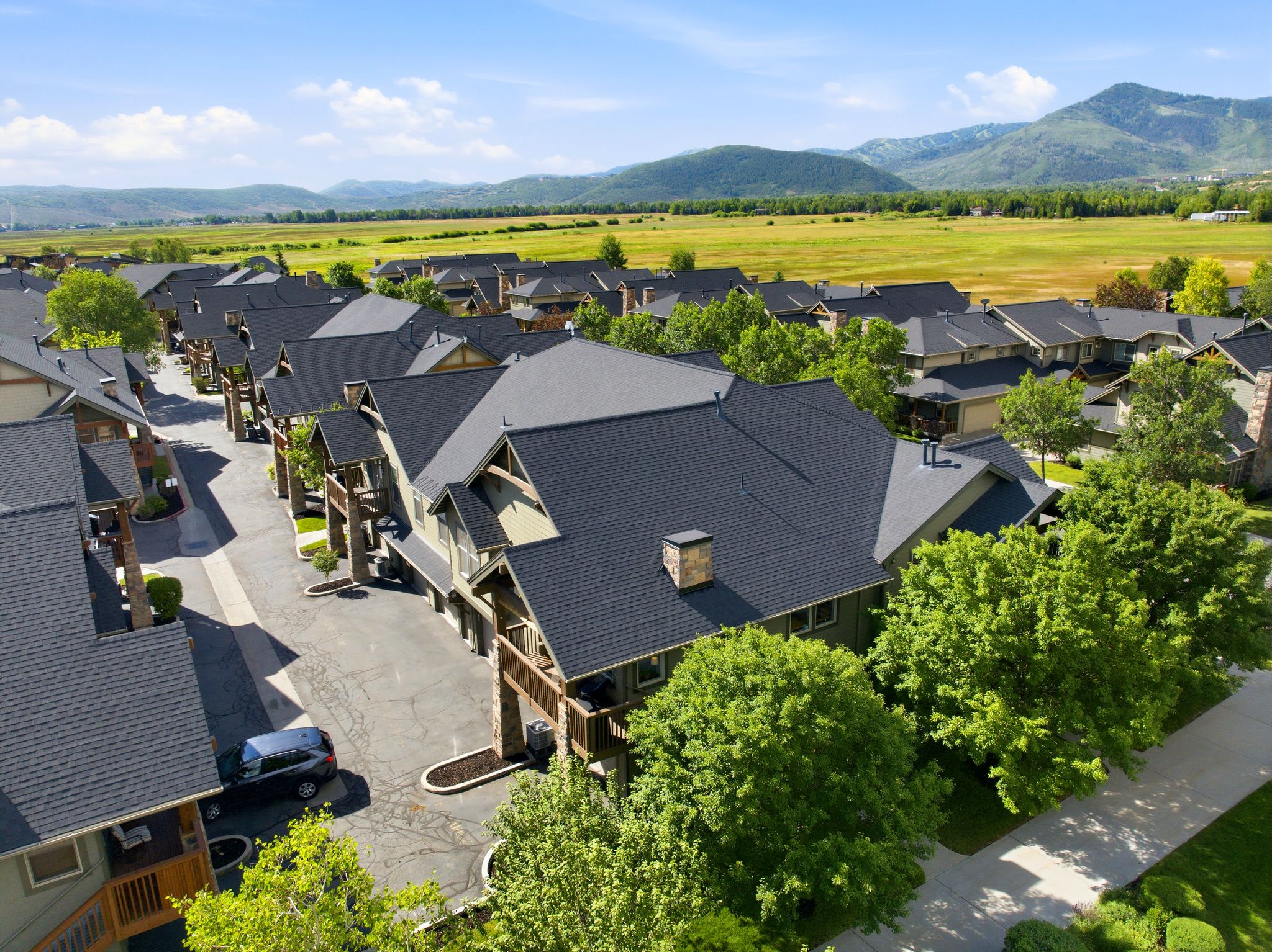Aerial perspective showcasing a residential community with multi-level properties