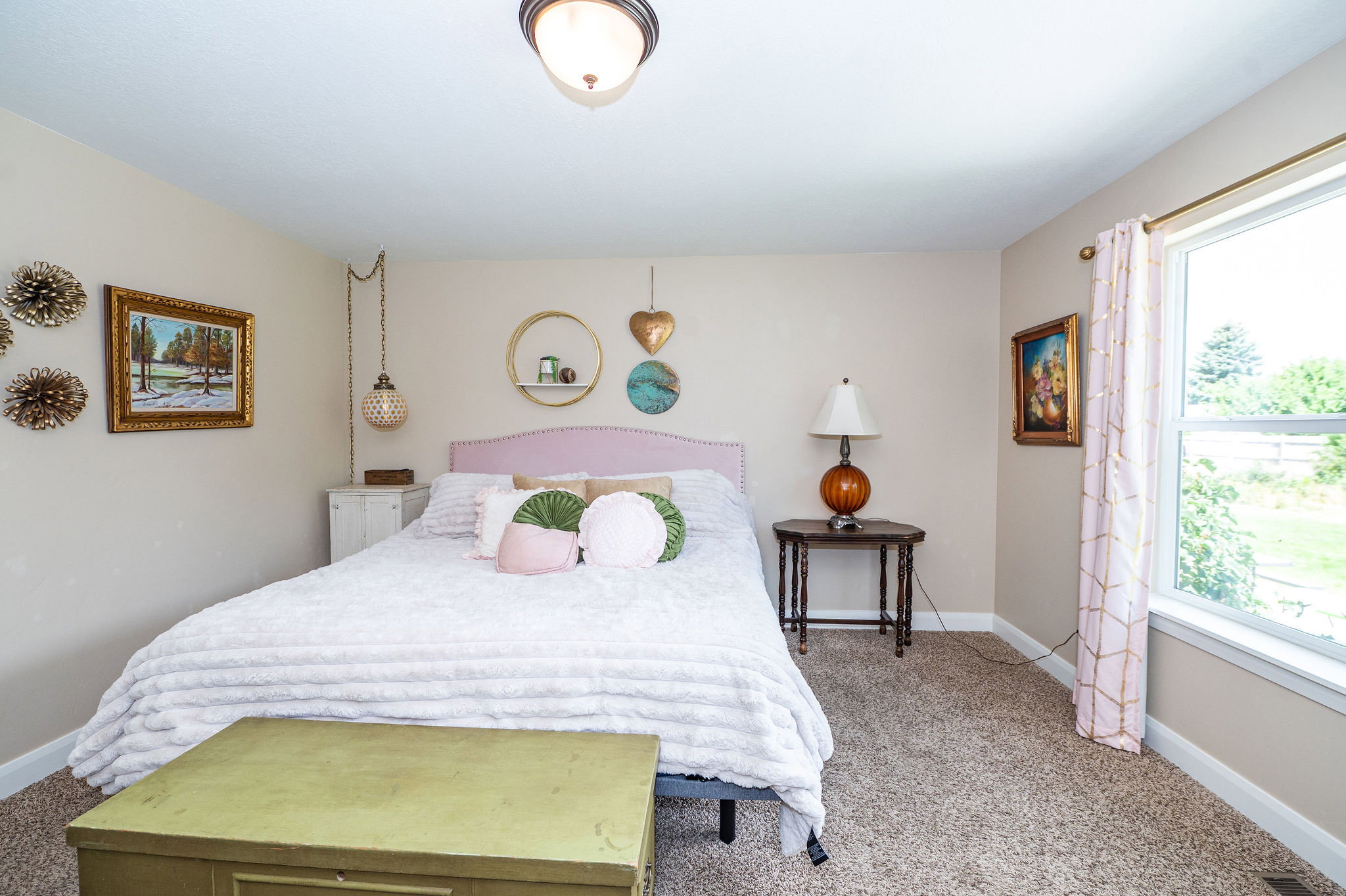 Carpeted room featuring a double-pane window, flush-mount ceiling light, and light-toned wall paint