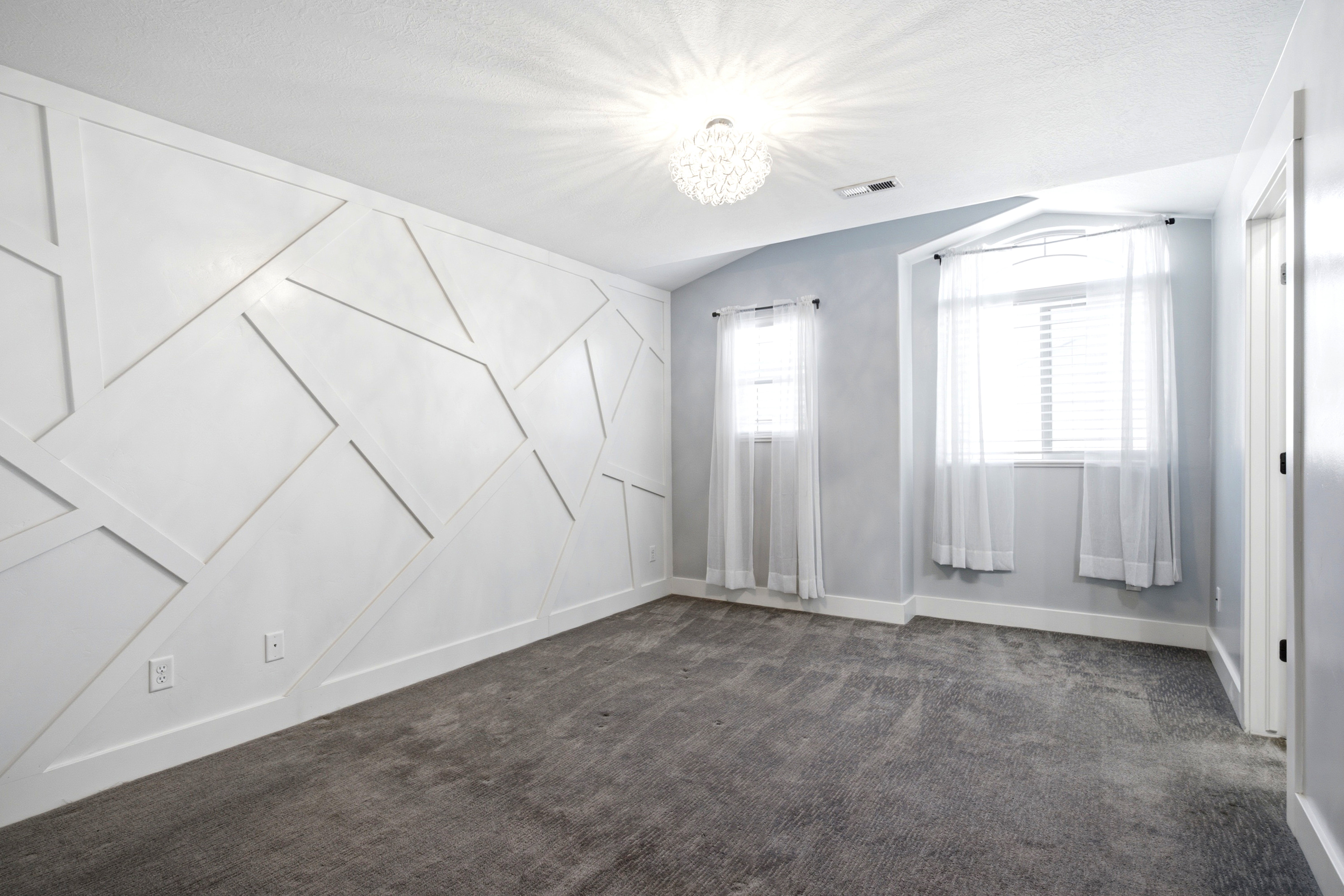 Accent wall featuring geometric paneling