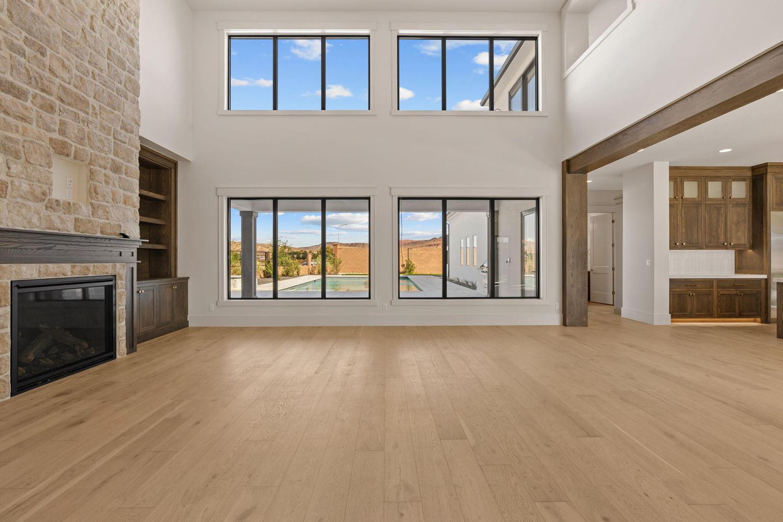 Soaring ceilings with extensive window fenestration