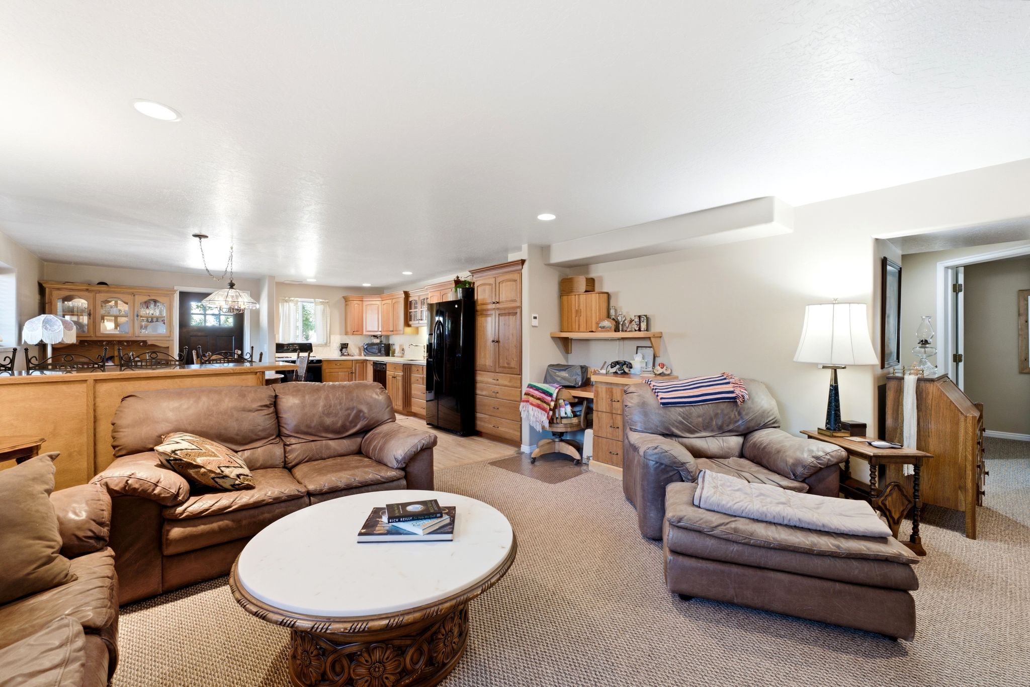 Lower level Open concept living area featuring recessed lighting