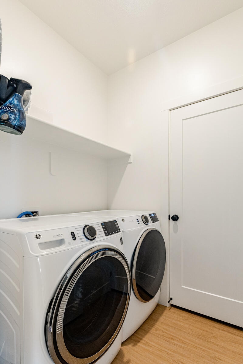 Large capacity washer and dryer included. Mechanical room behind pictured door (with storage space)