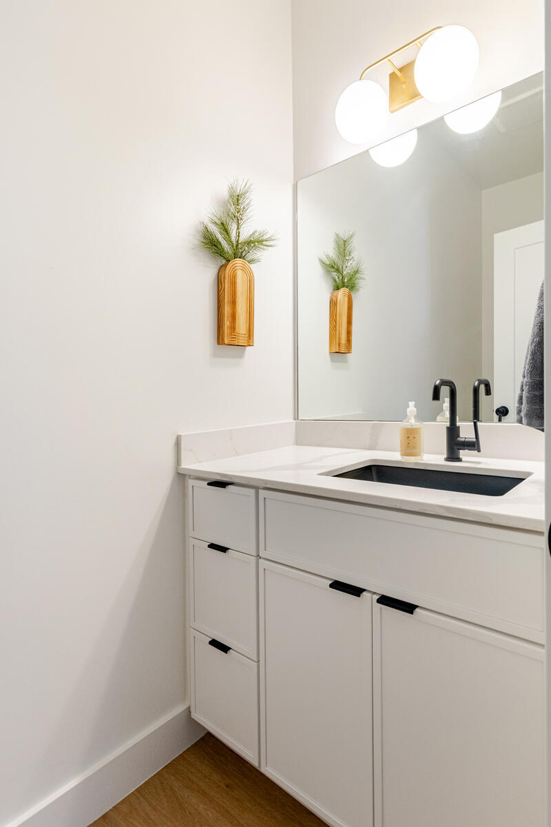 Half bathroom in the main entry hallway.