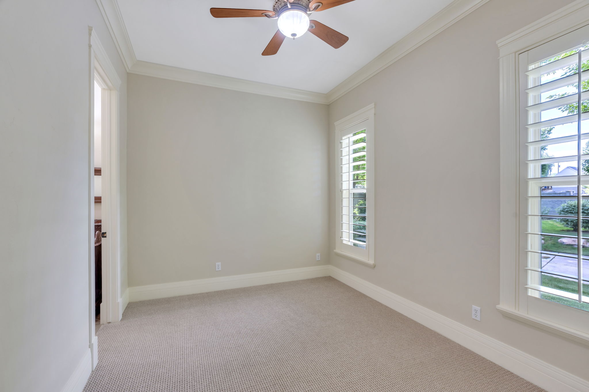 2nd Main Floor Bedroom with ensuite bath. Used for bedroom and/or second home office