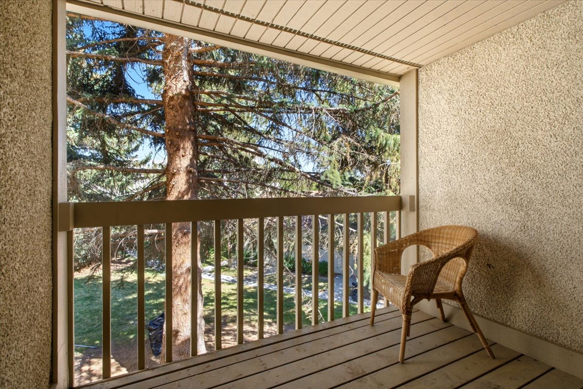 Secluded upper balcony with tree lined views.