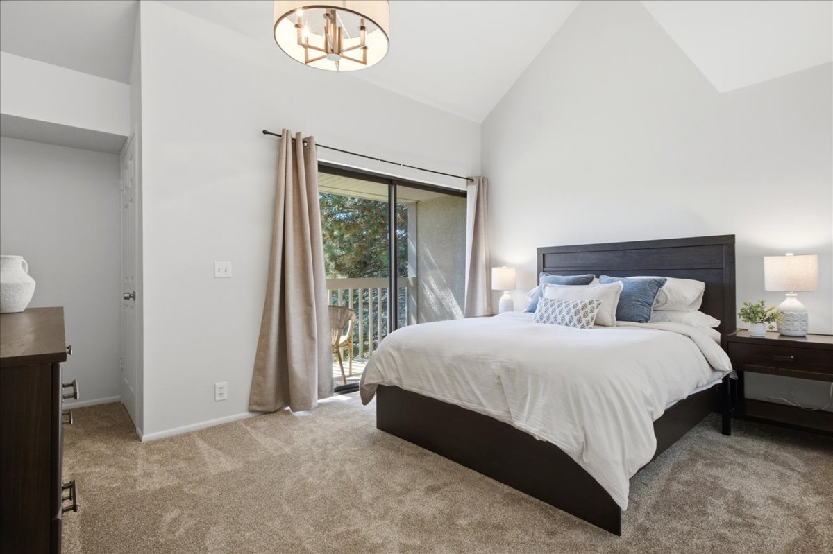 Bright bedroom with balcony access