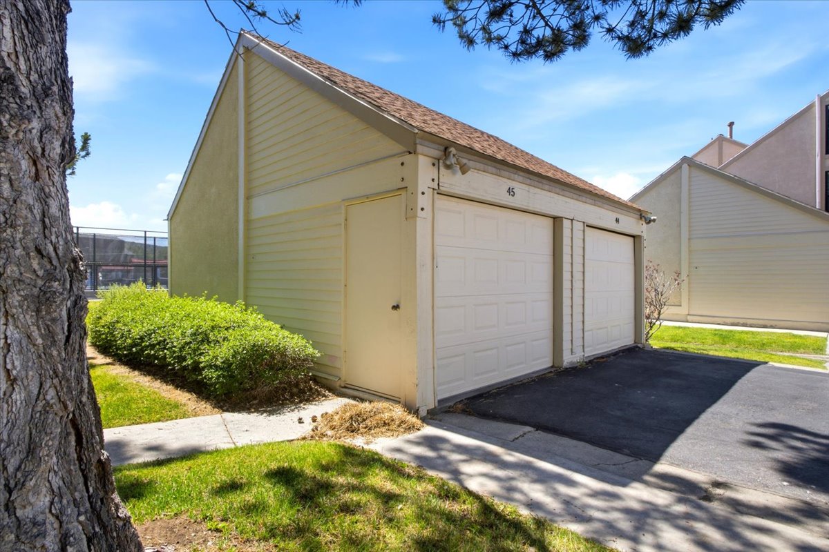 Dedicated detached one-car garage provides secure vehicle parking along with extra storage space for skis, bikes, and outdoor gear.