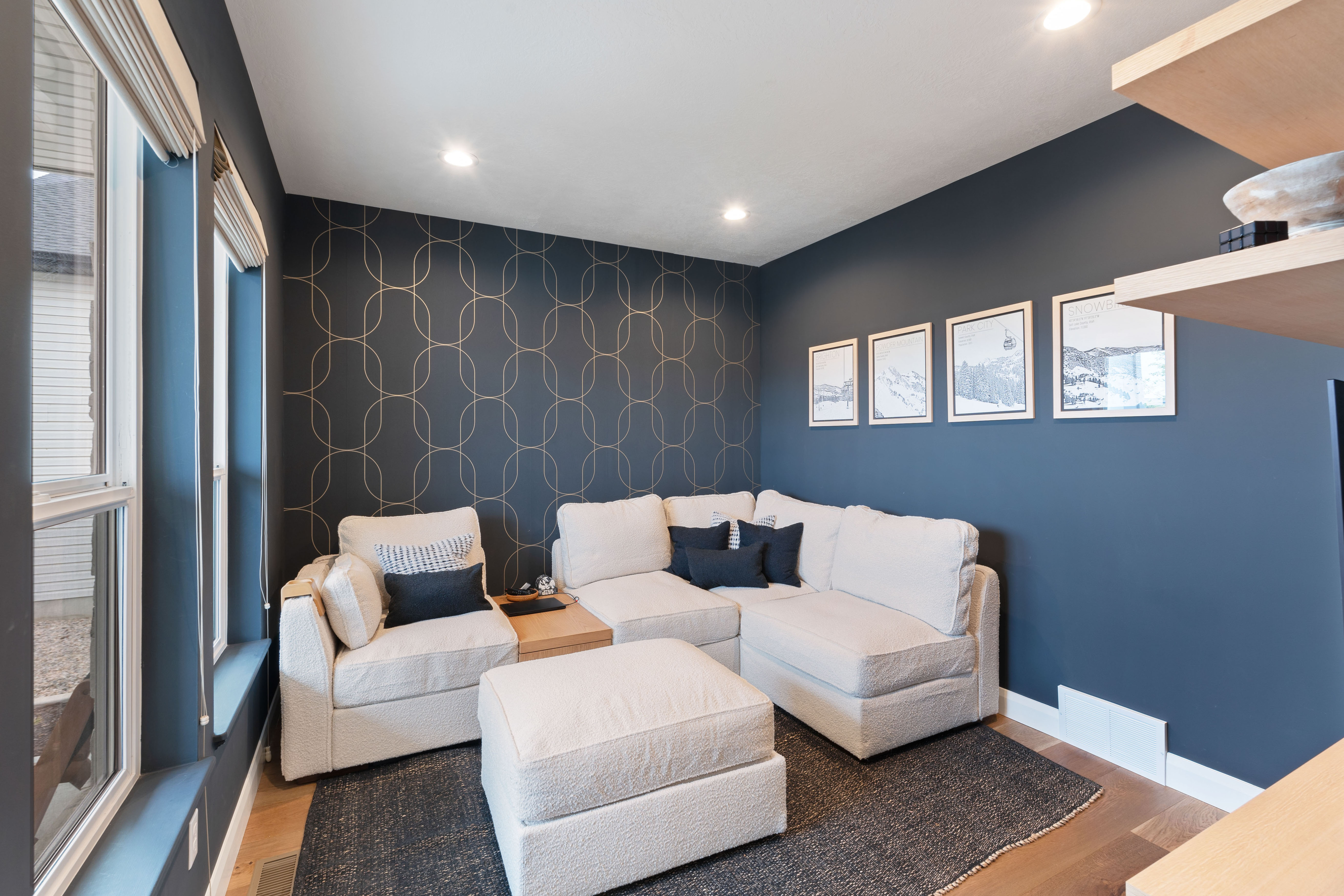 Study/Den with Accent wall featuring a geometric pattern