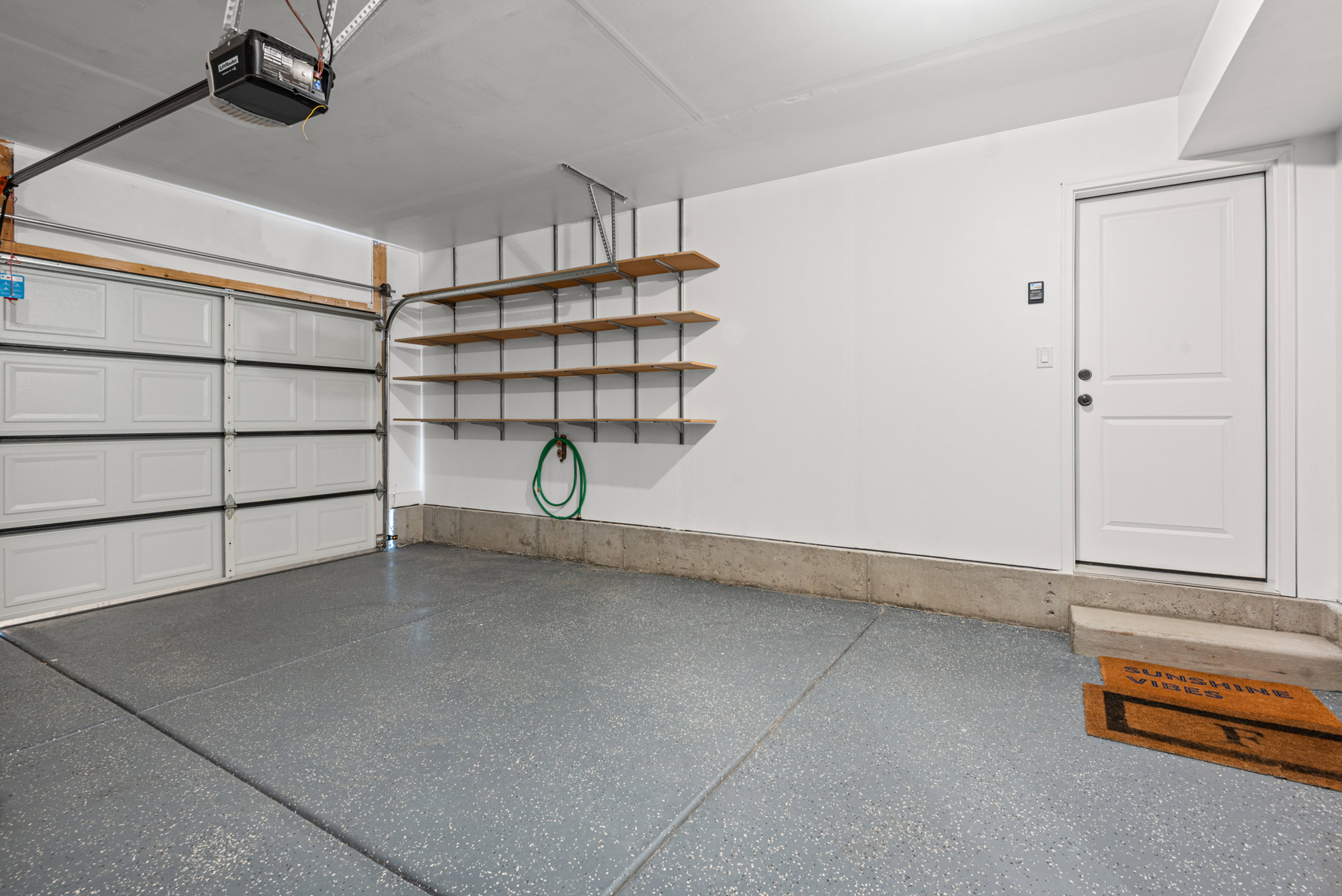 2 car garage with Upgraded Hose Bib and Epoxy floor