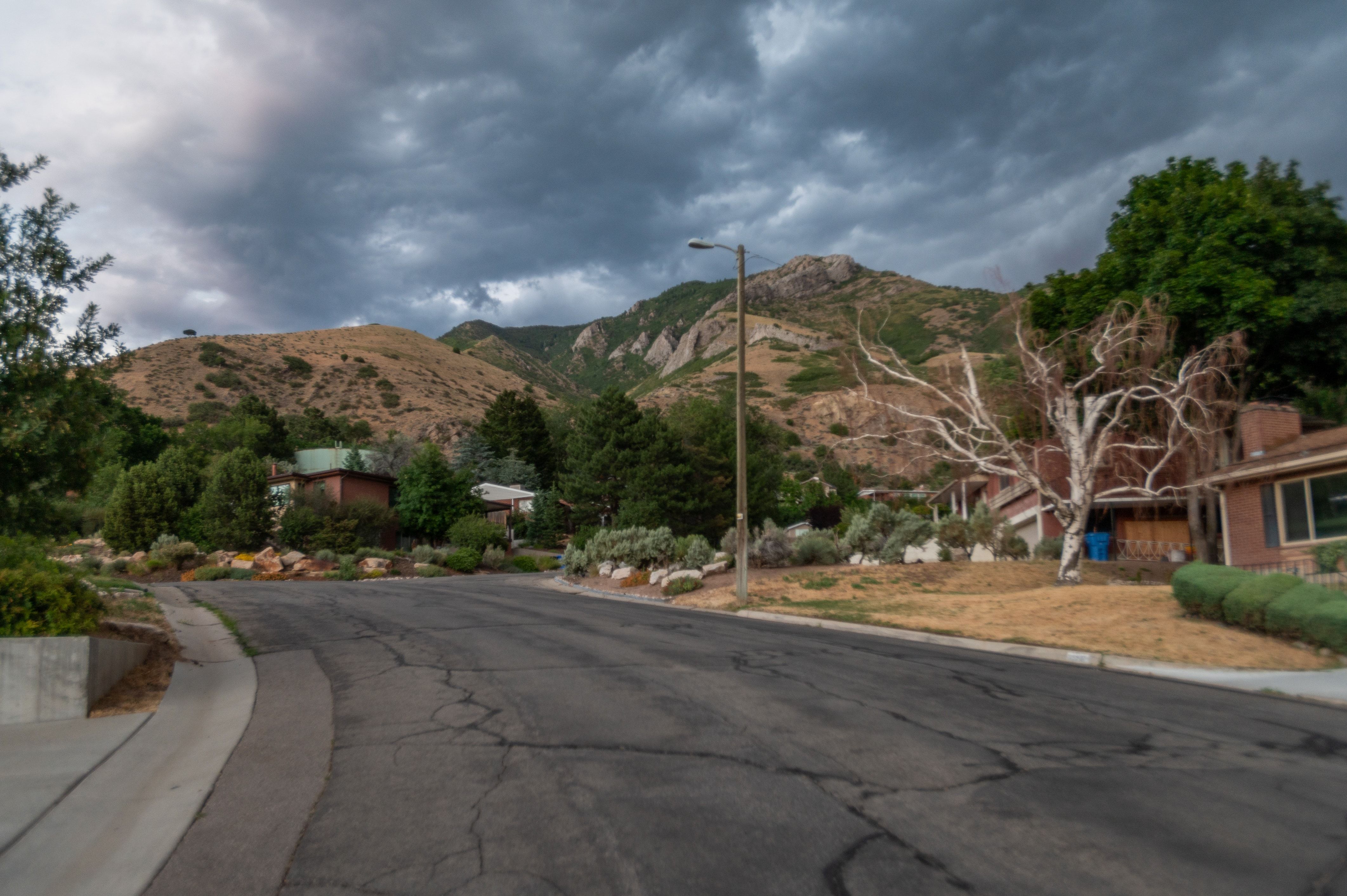 Hillside setting featuring natural rock formations and varied topography