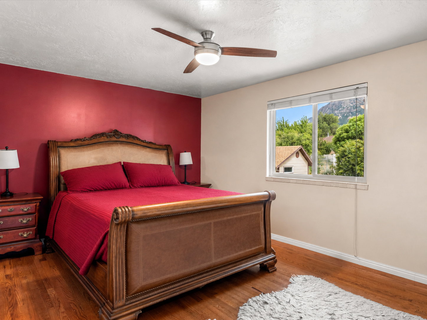 Bedroom with hardwood flooring