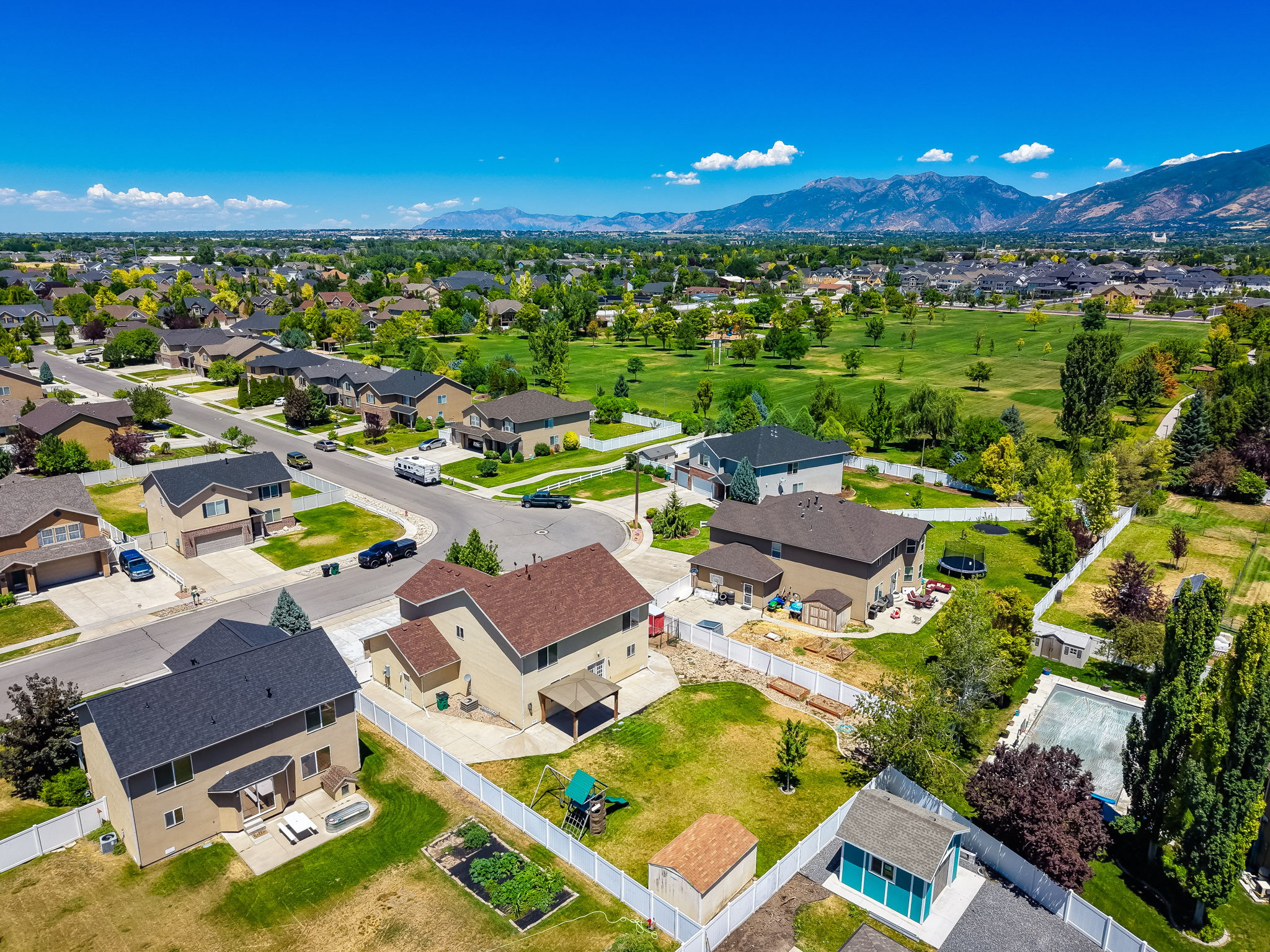 17 Acre Angel Street Soccer Park within steps. Residential neighborhood with expansive green spaces and mountainous backdrop