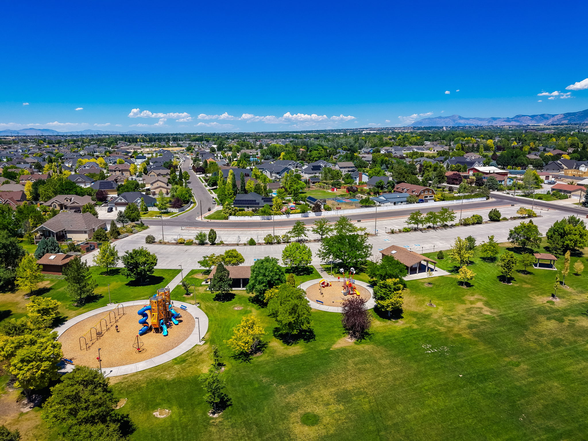 Angel Street Soccer Complex just steps away. Community park with multiple play structures, expansive green spaces, shaded picnic areas, and paved walking paths