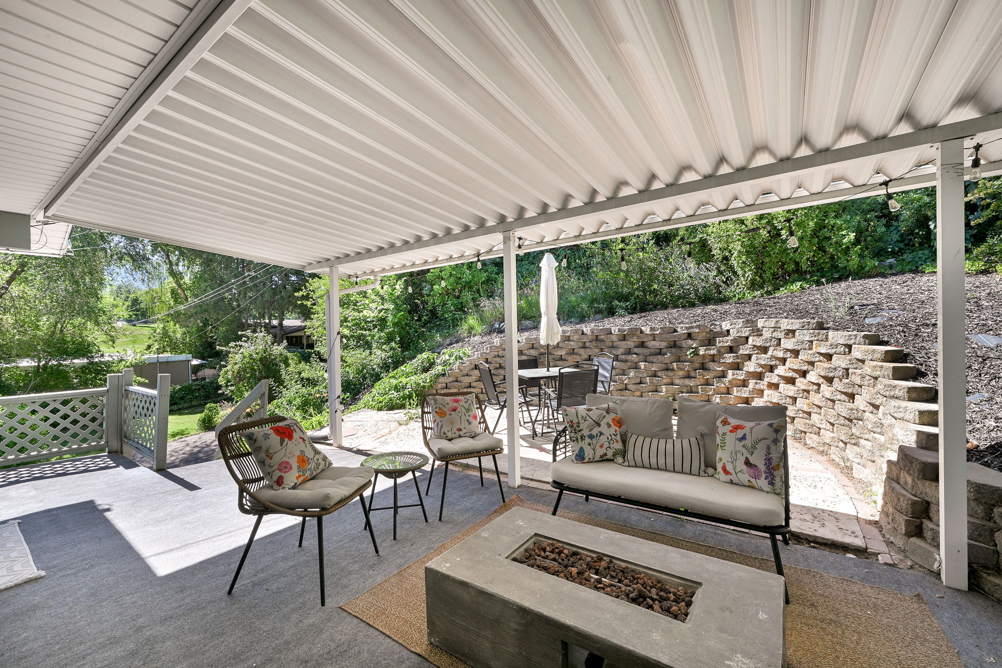 Covered patio featuring a corrugated white metal roof