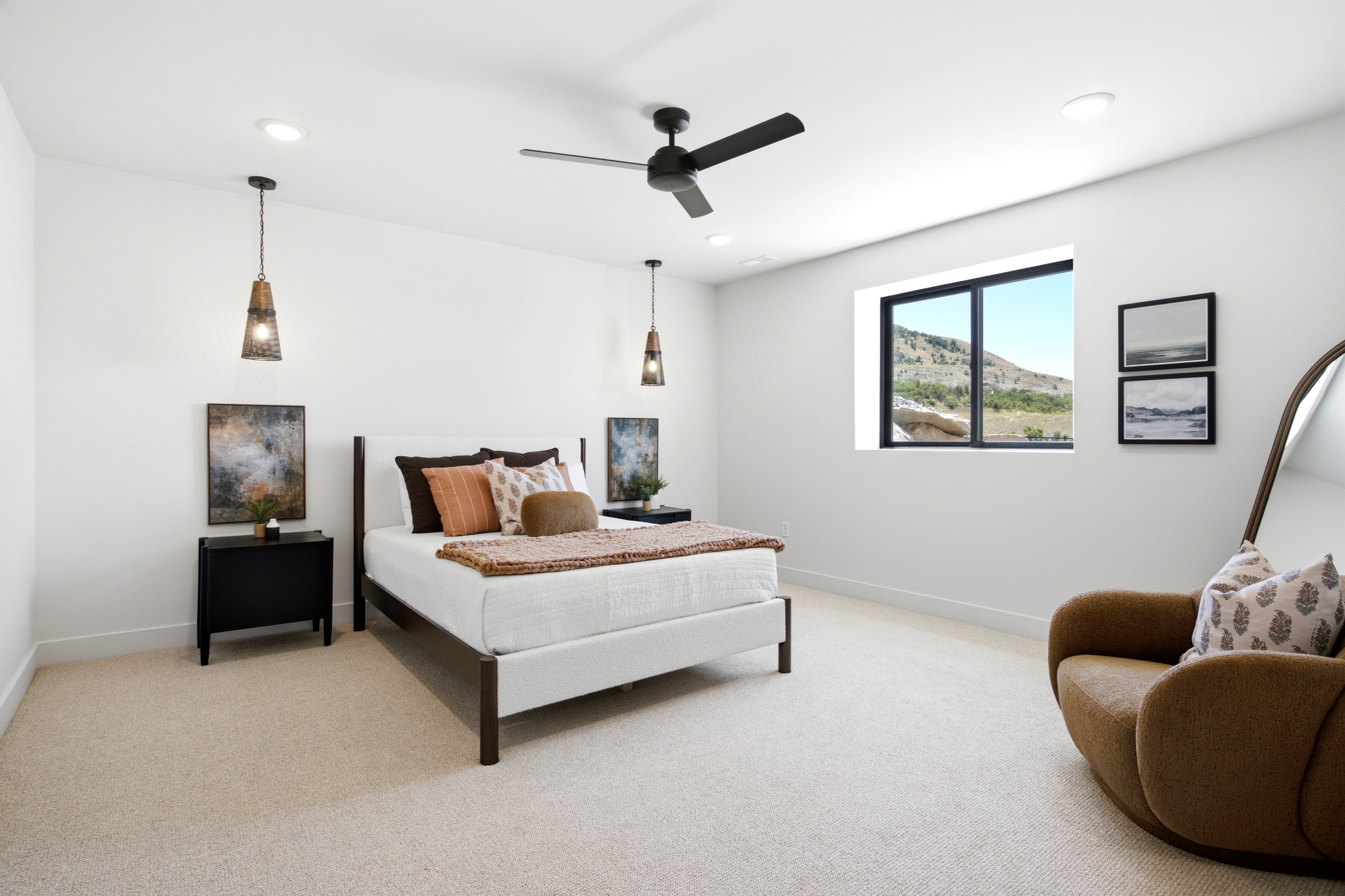Bright bedroom featuring carpet flooring, recessed lighting, a ceiling fan, and a large window