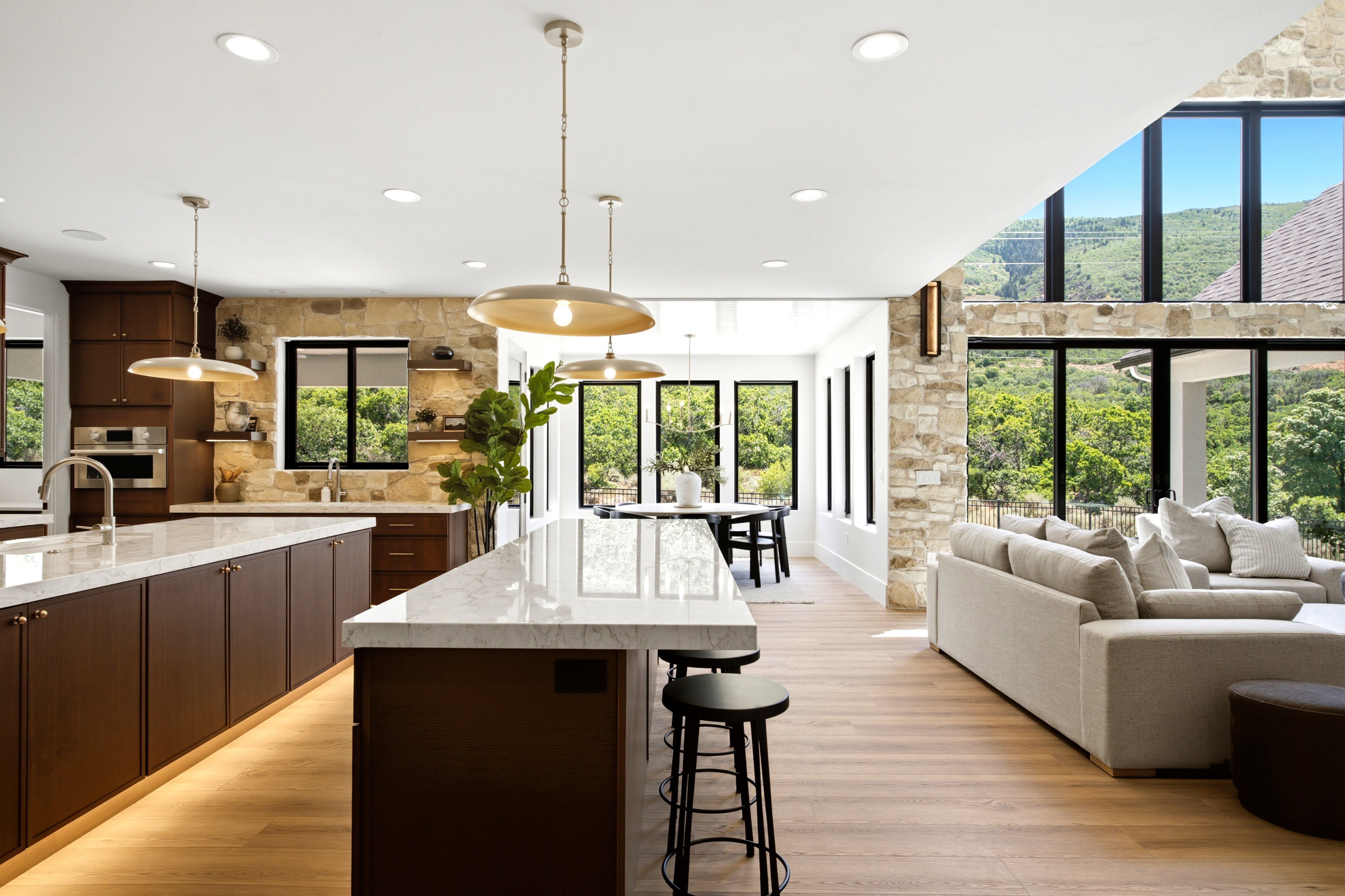 Open-concept living area featuring light wood-finish flooring throughout