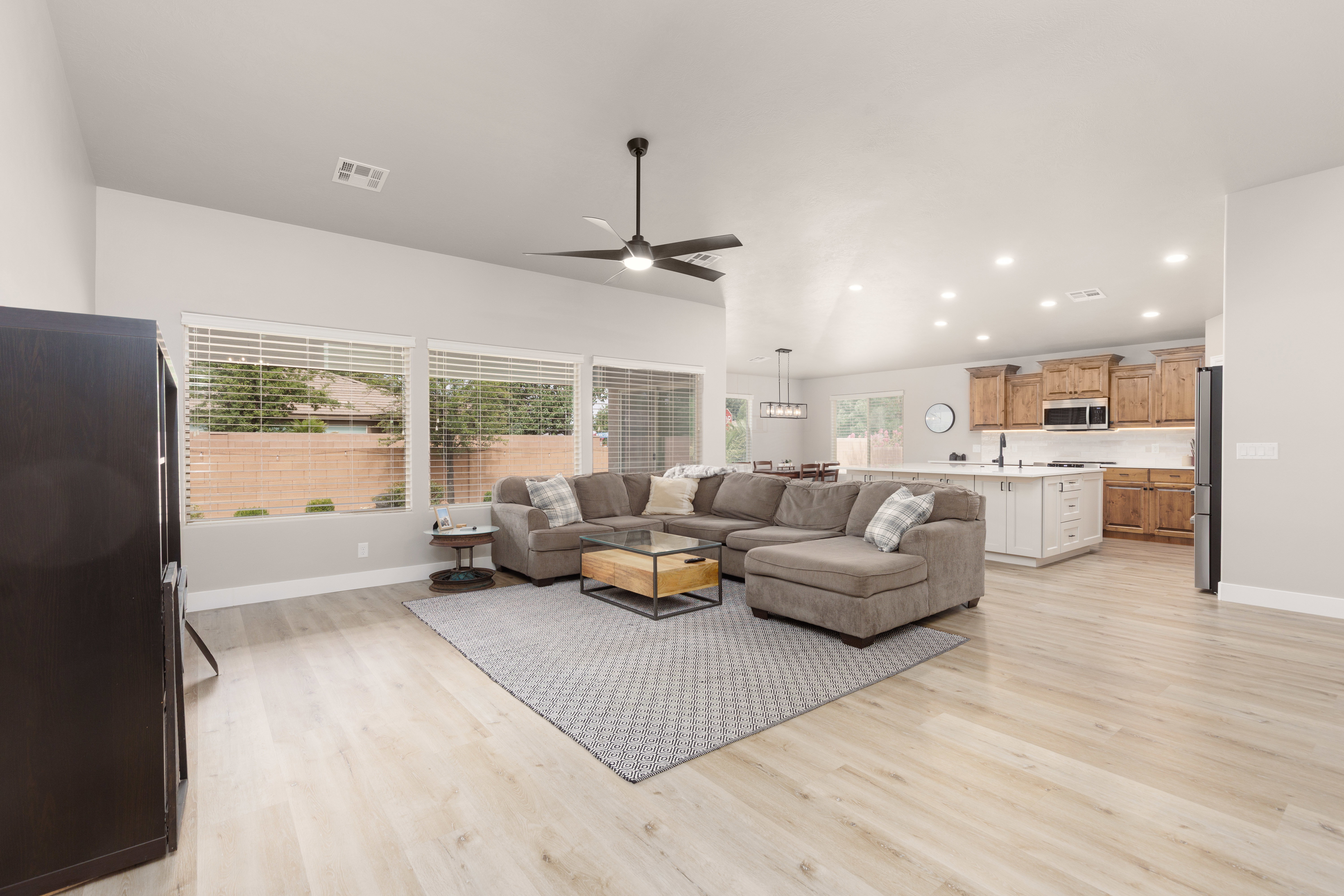 Open-concept living space featuring a spacious living room and kitchen