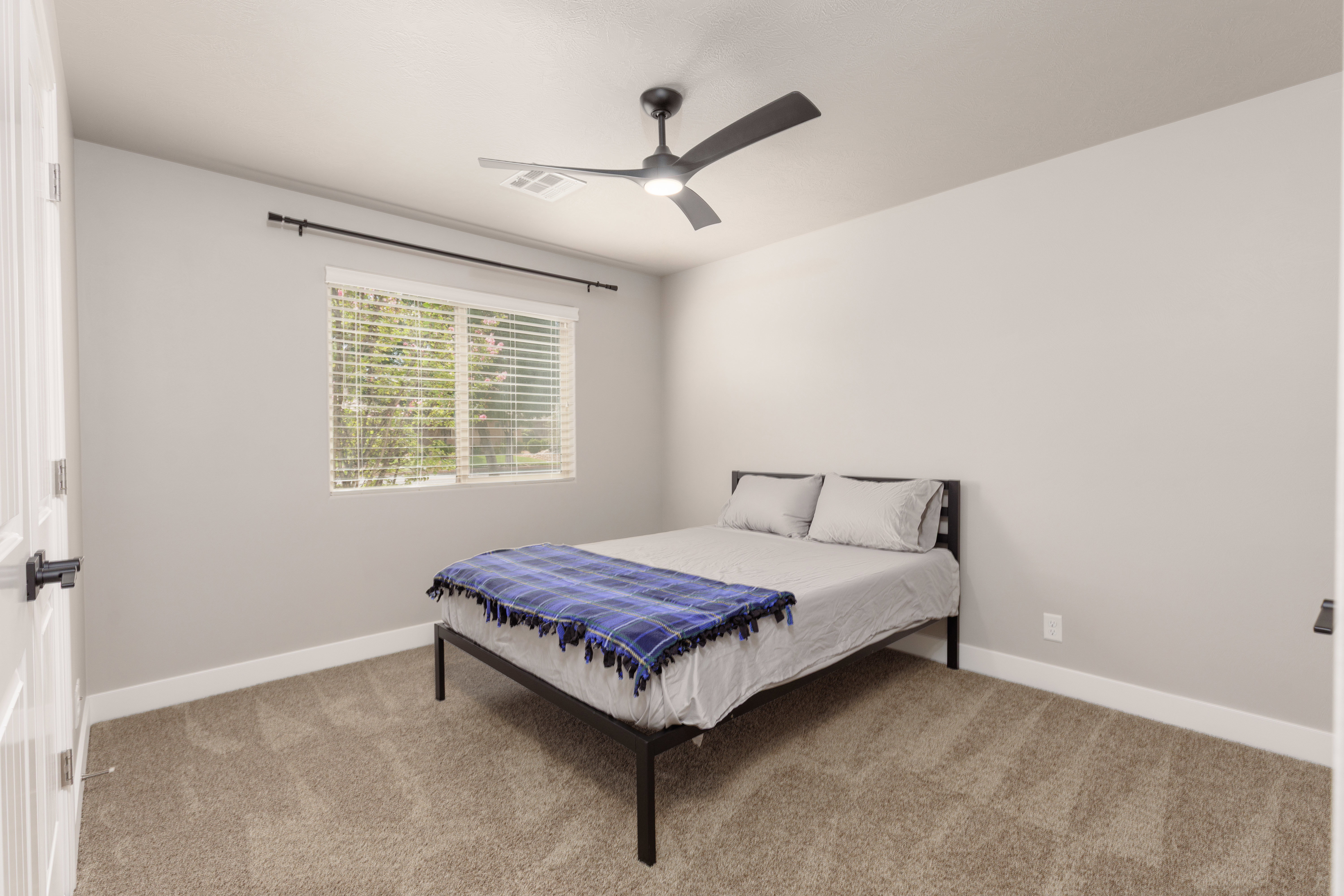 Guest bedroom 1, will fit a queen size bed and dresser