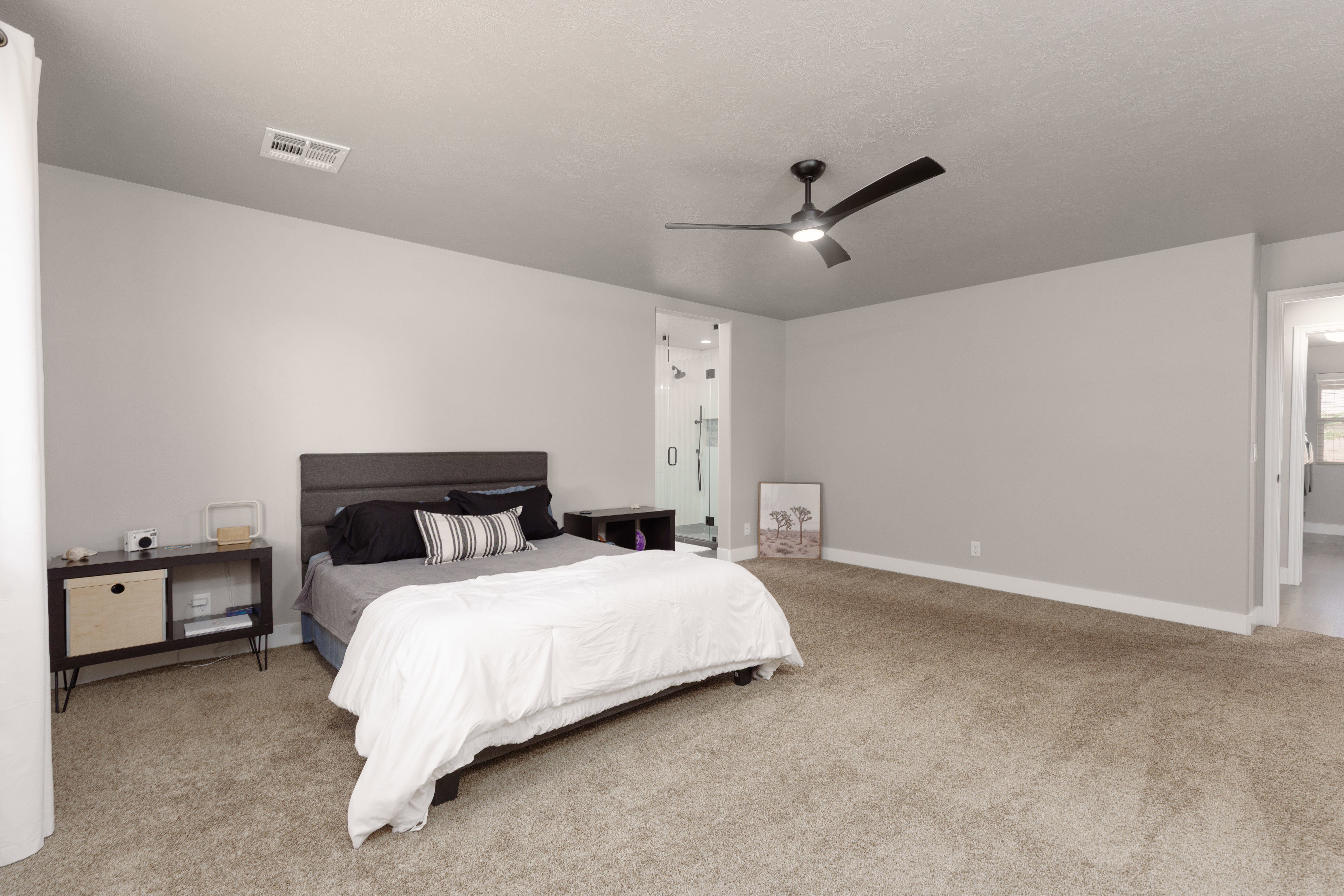Large primary bedroom with custom ensuite bathroom