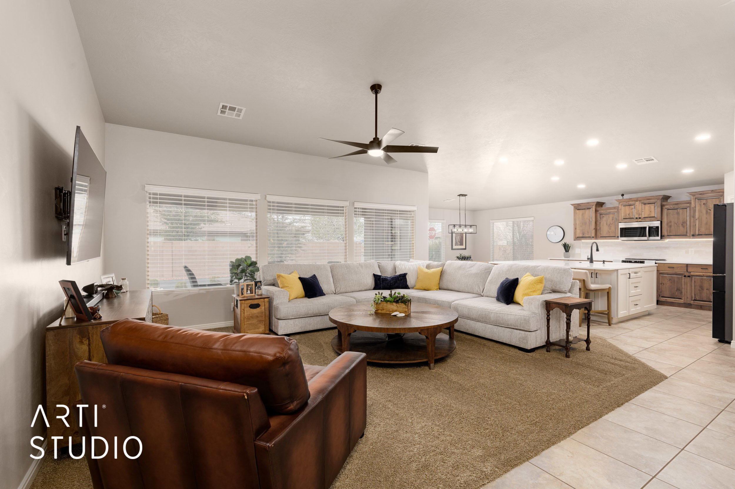 Open-concept living space featuring a spacious living room and kitchen