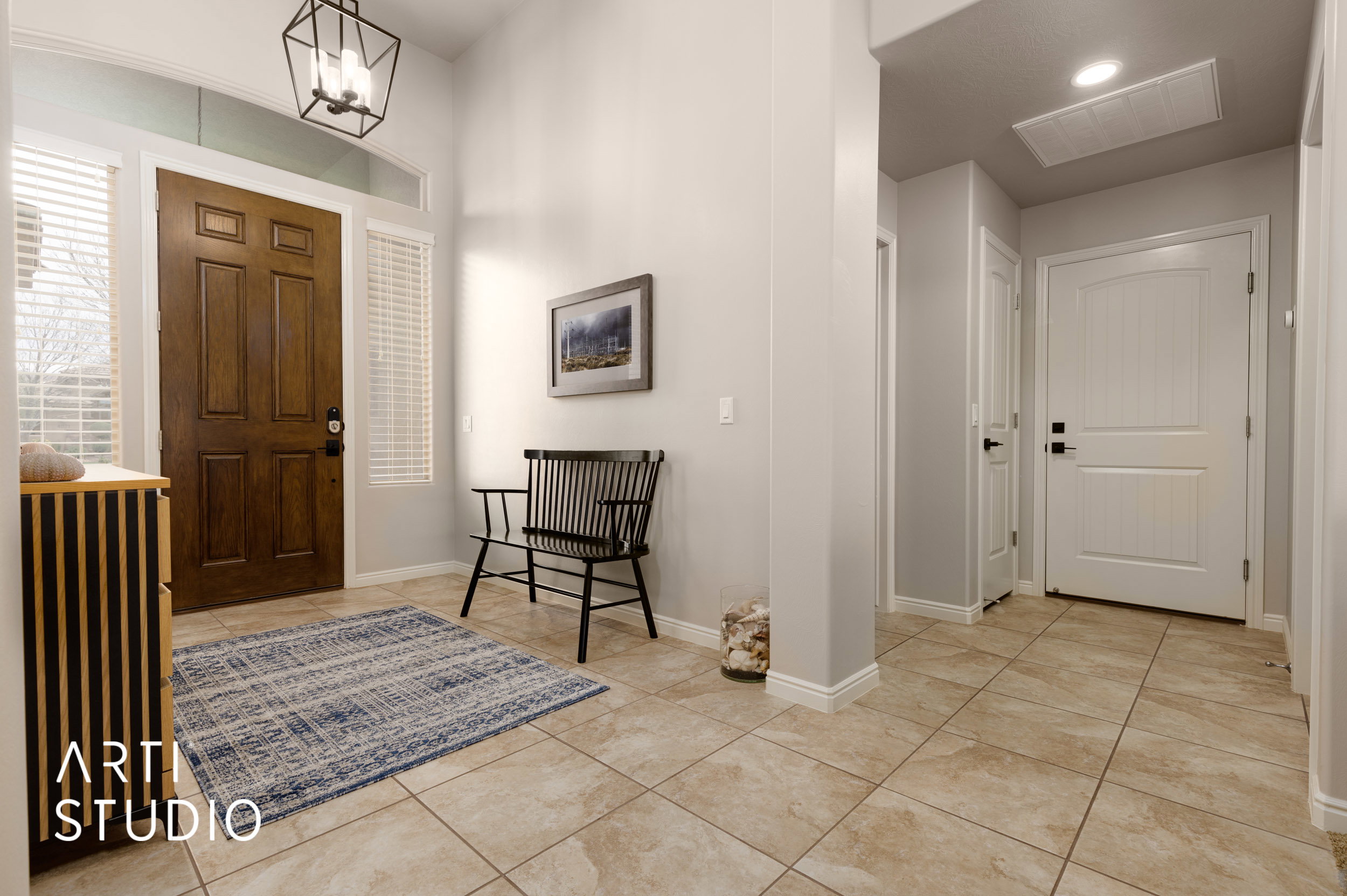 Entryway featuring and neutral wall tones