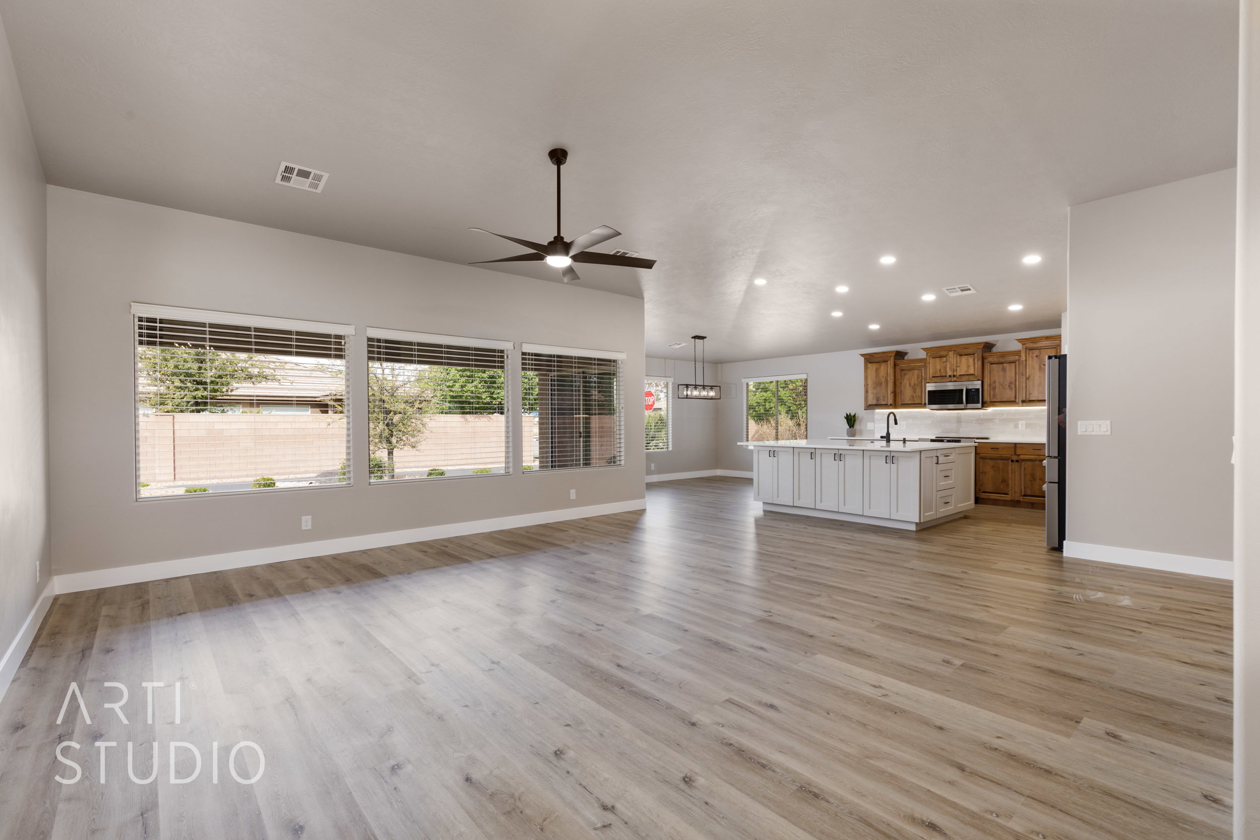 Open concept living, kitchen and dining featuring new LVP flooring.