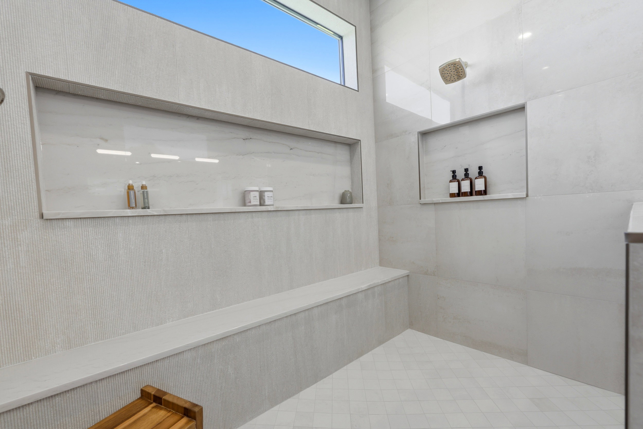 Primary ensuite shower with window